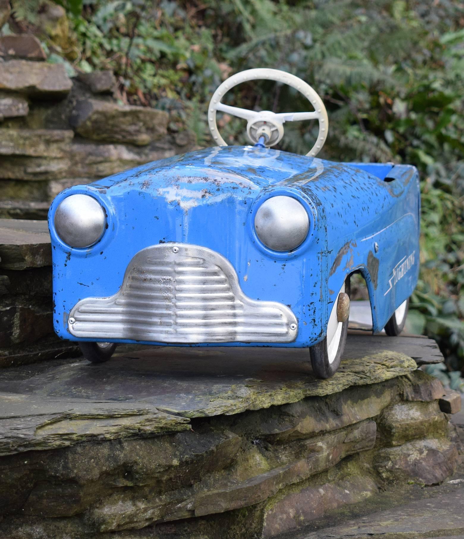 This is a great opportunity to acquire a totally authentic Triang lightening child’s pedal car. Produced in the 1950s and with a modified suspension this car has undergone a very recent full nut and bolt restoration to enhance the original color and