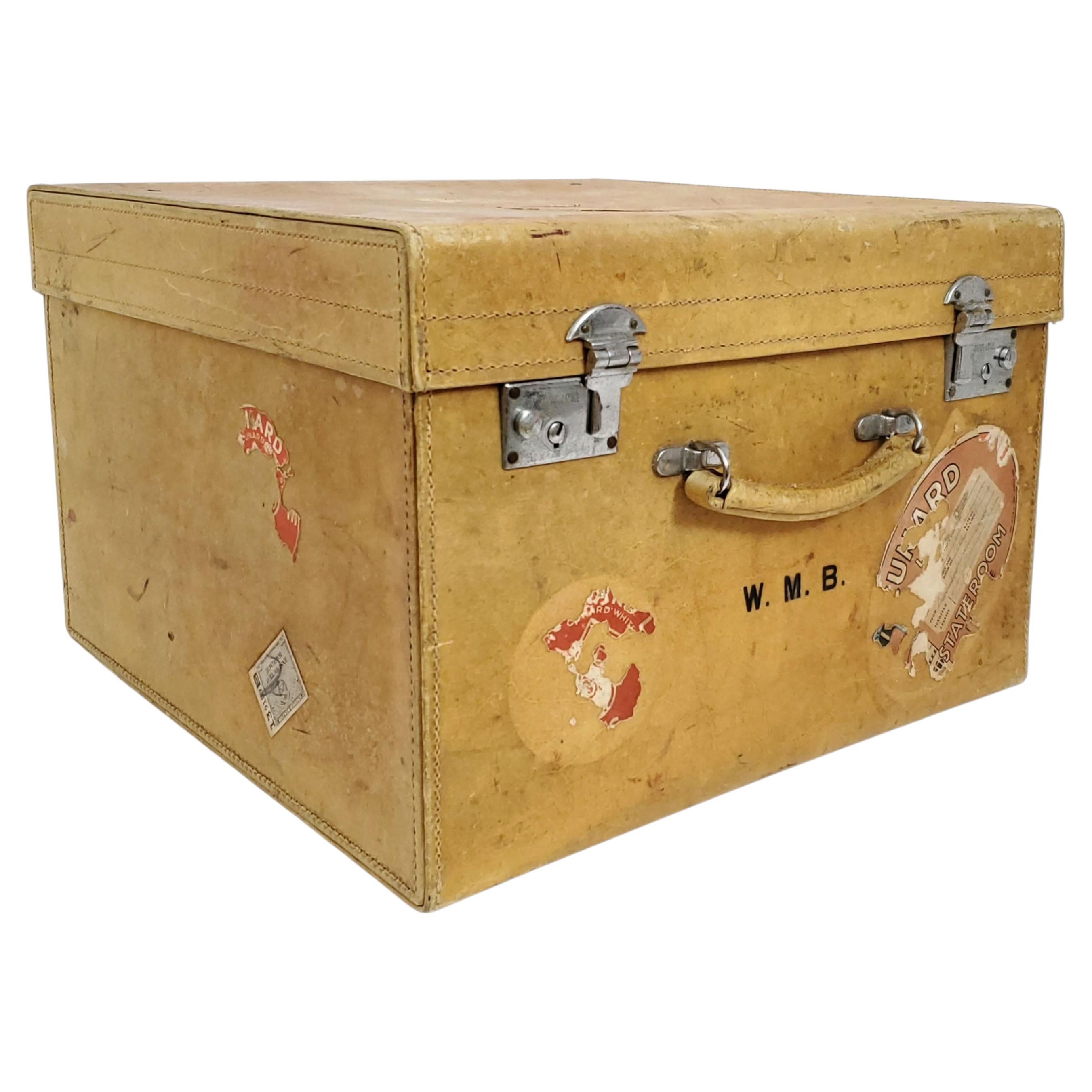 How do you clean an old Hartmann suitcase?