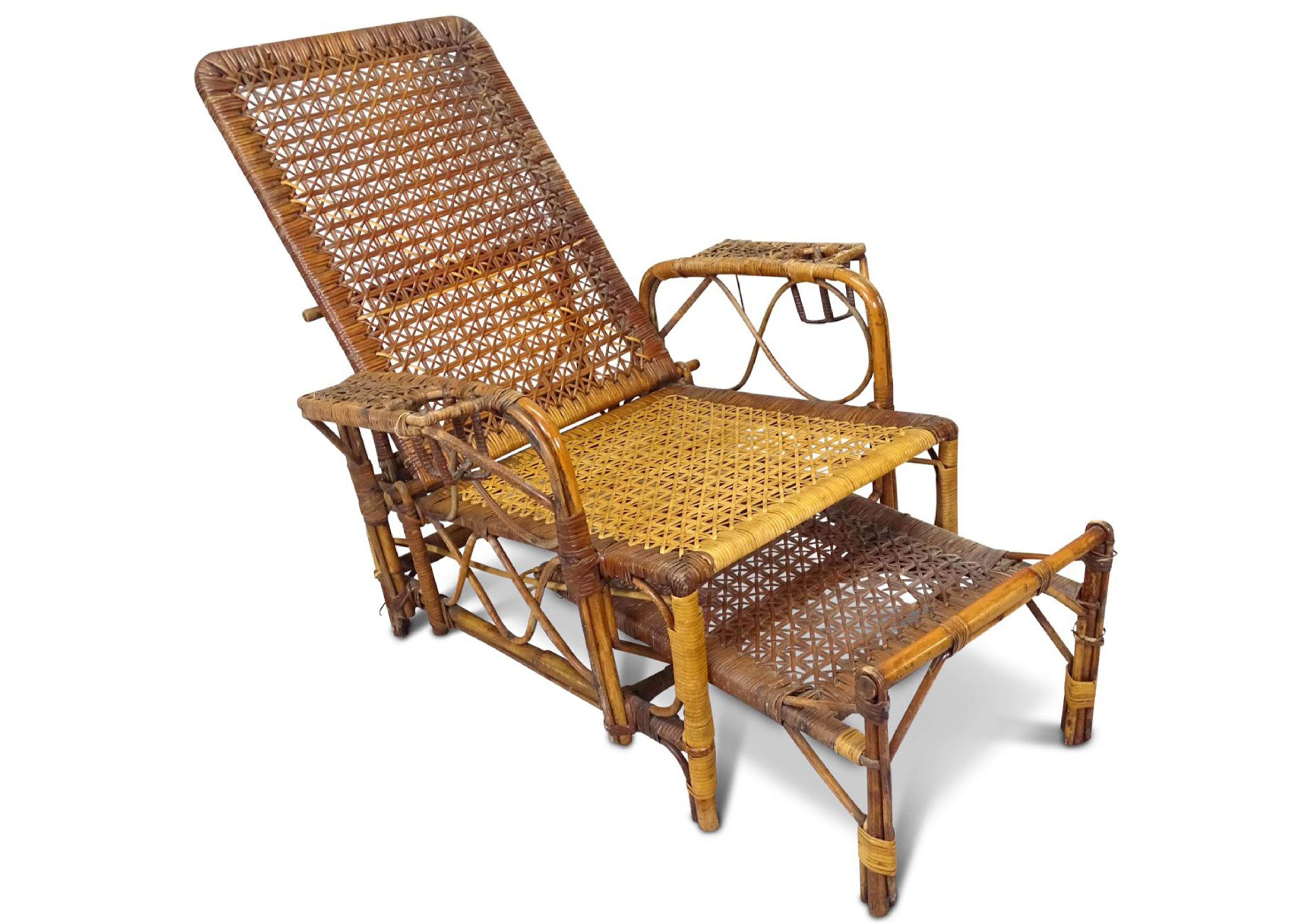 A British Colonial Formed Bamboo & Cane Reclining Steamer armchair with Pull Out Footrest 1900's

Exquisite indoor or outdoor reclining chair suited to both period and modern home settings.
Featuring drinks bentwood formed drink holders.


