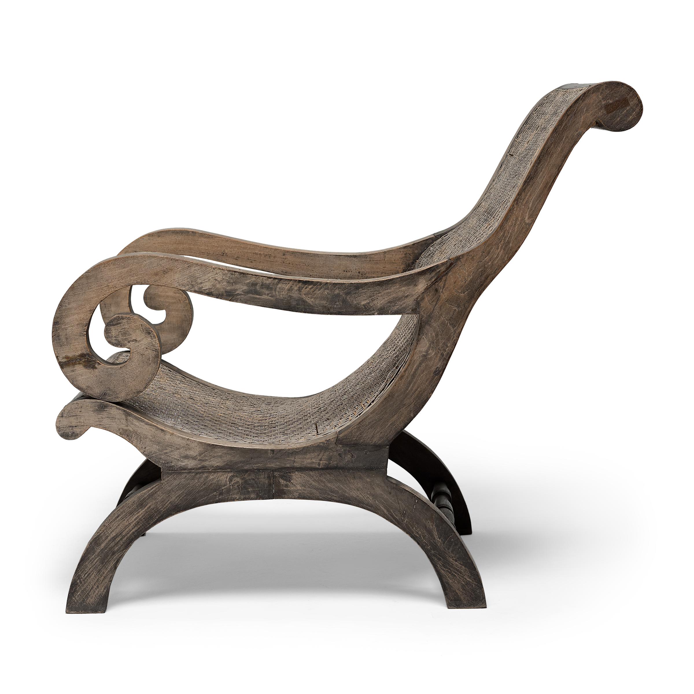 Rustique Chaise longue coloniale en rotin tressé, C.I.C. 1900 en vente