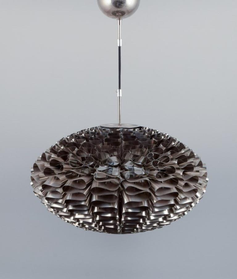 Britt Kornum for Normann Copenhagen. Ceiling lamp in stainless steel.
Model Norm 03.
Early 21st century.
In perfect condition.
Dimensions: H 32.0 cm (with cord 65.0 cm) x D 55.0 cm.

