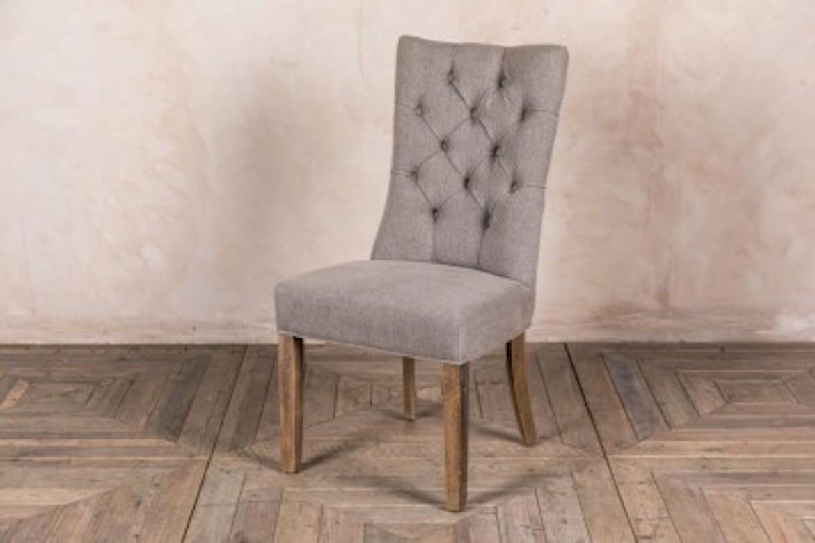 A fine Brittany linen upholstered chair range, 20th century.

This lovely mixed linen upholstered chair comes from our range of French inspired button back dining chairs, sofas, benches and armchairs.

This button back 'Brittany' chair has a