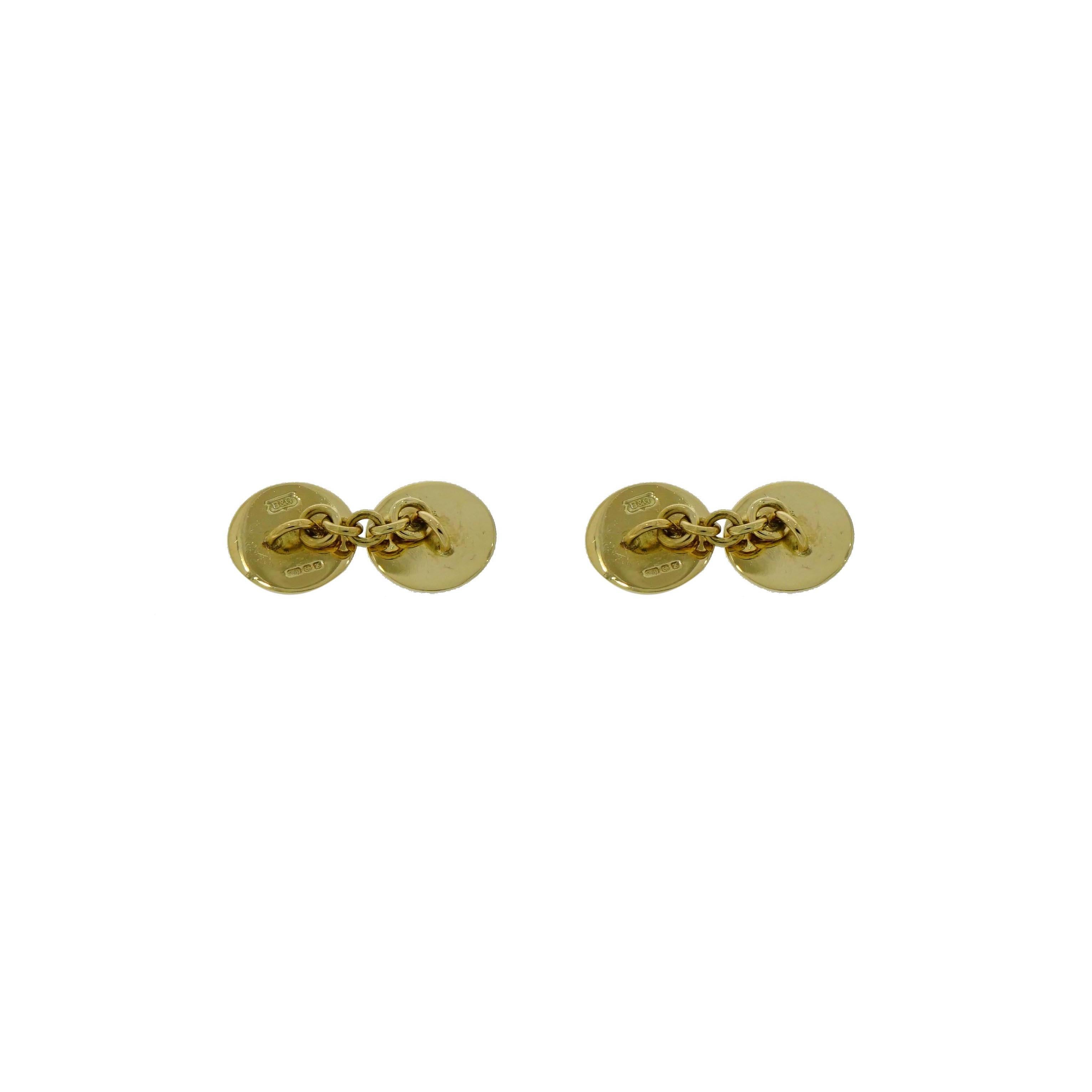 This gorgeous pair of cufflinks is crafted in 18k yellow gold by Brixton & Gill.
Features a beautiful red enamel that is framed by a line of deep blue contrasting with the yellow gold.
Measures 14mm in diameter. 