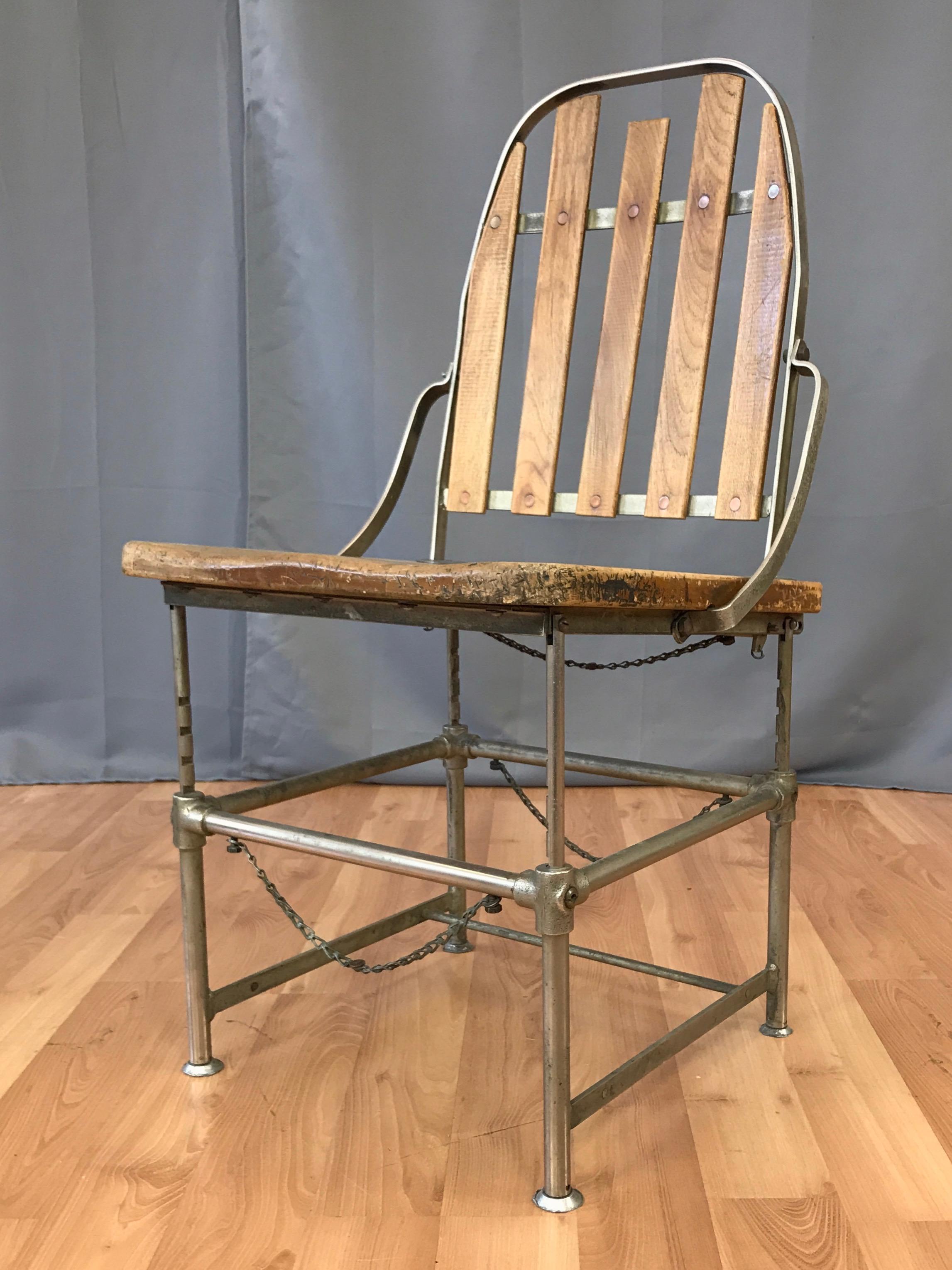 An important and rare iron and wood “Adjustable Industrial Chair” by Brizard & Young of San Francisco, California, dating from the turn of the 20th century. Produced for a brief time in limited numbers, this innovative early Machine Age design is