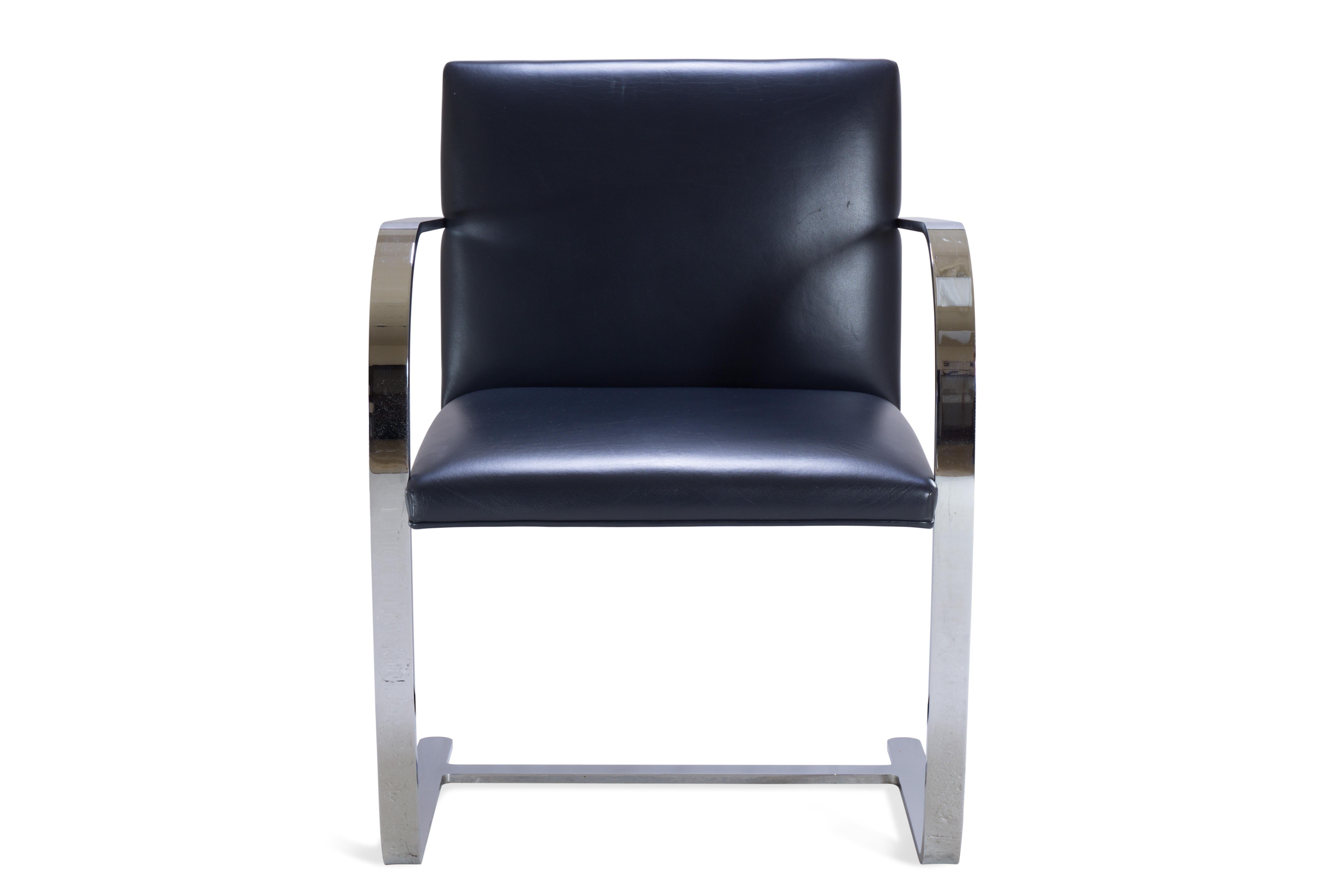 The definition of minimalism in a singular design, achieved by the great Ludwig Mies van der Rohe in 1929, the Brno flat-bar chair is just that. These are contemporary edition Mies van der Rohe for Knoll chairs upholstered in classic original navy
