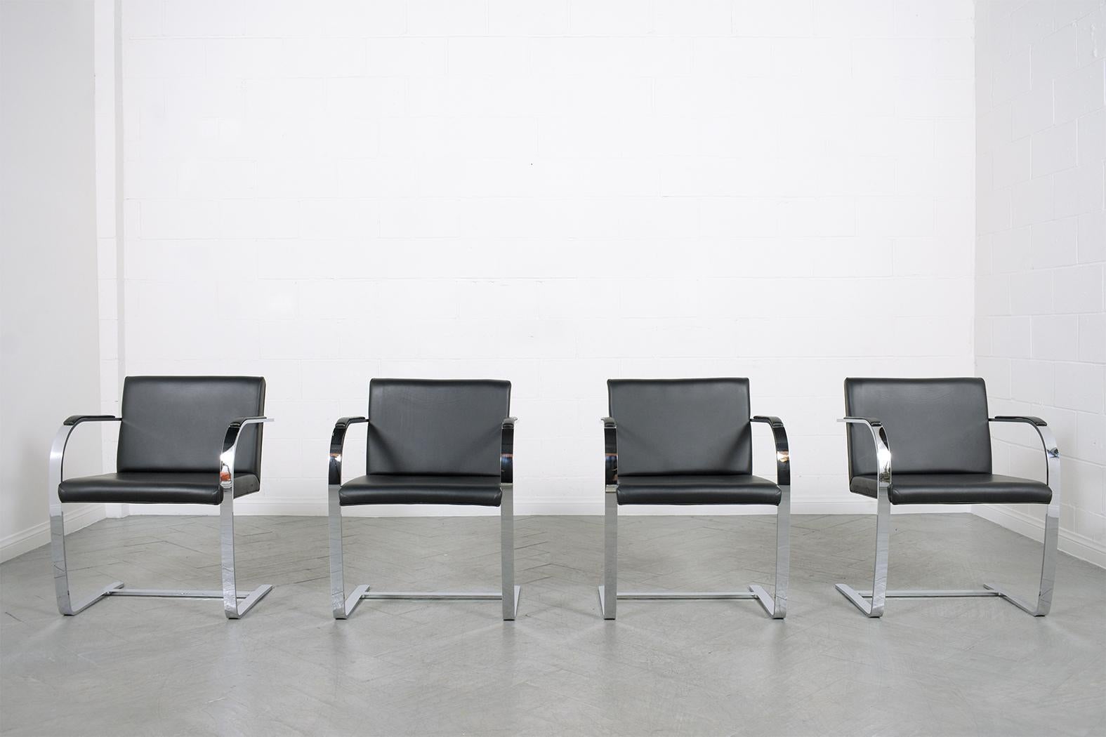 Elevate your space with our exquisite set of four Brno Armchairs, inspired by the legendary designs of Mies Van Der Rohe. These chairs are in excellent condition, meticulously cleaned, waxed, and polished by our team of expert craftsmen to preserve