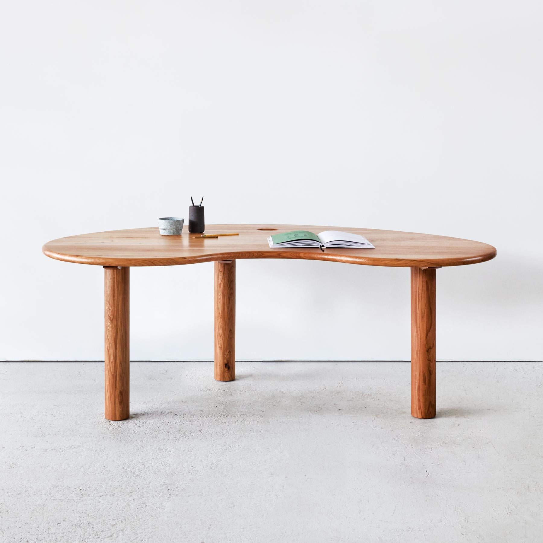 Inspired by organic forms, the Broadleaf desk is handcrafted from solid British wood. The desk combines gentle curves with a playful three-legged base, creating a dynamic sense of movement.

With removable cylindrical legs, the desk can be easily