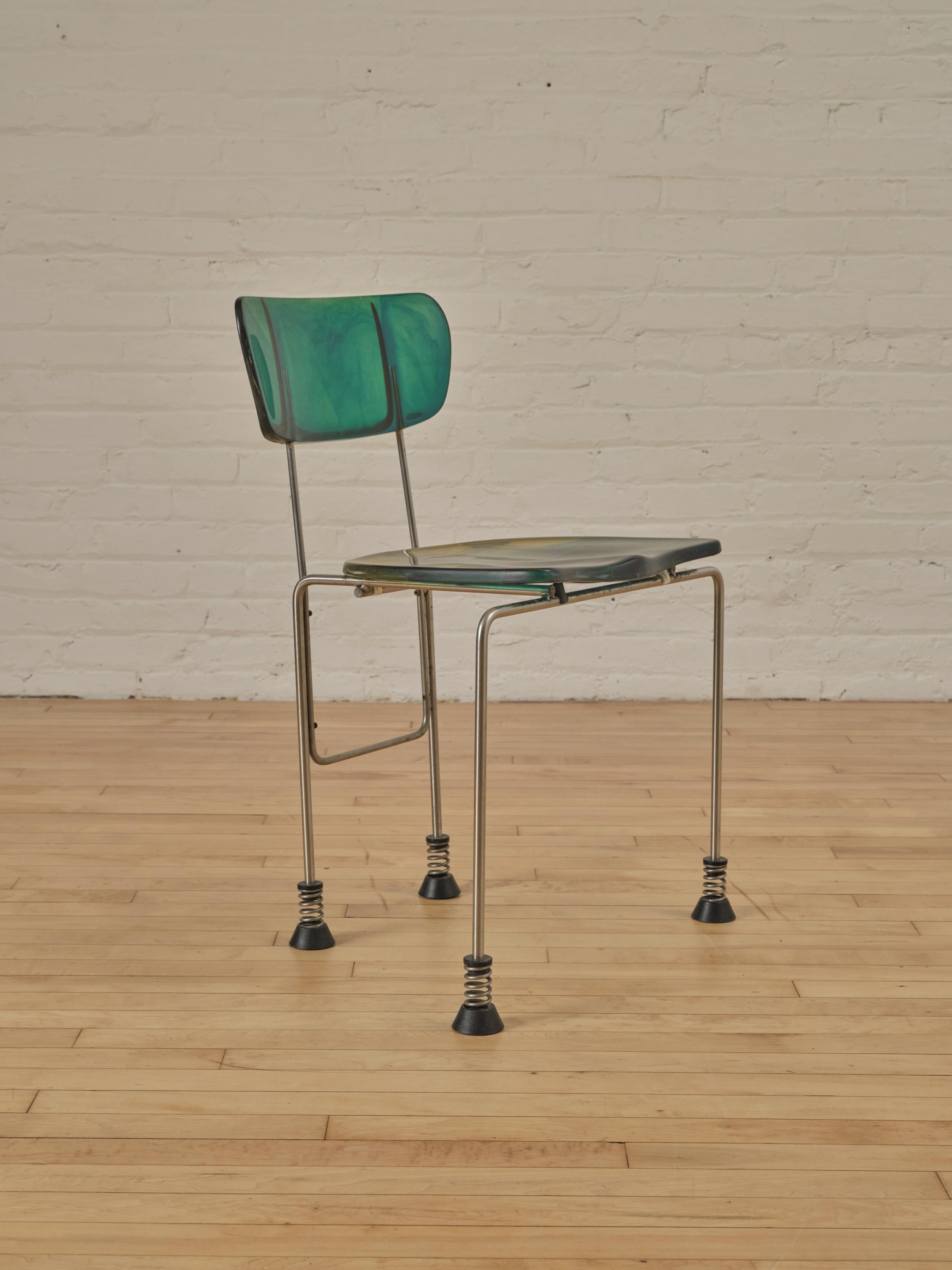Sculptural Broadway chair designed by Gaetano Pesce for Bernini. Each chair features a marble green hue.Supported by flexible and dynamic brushed steel frame. The seat and back are cast in the Gaetano's signature resin. Finished with round spring