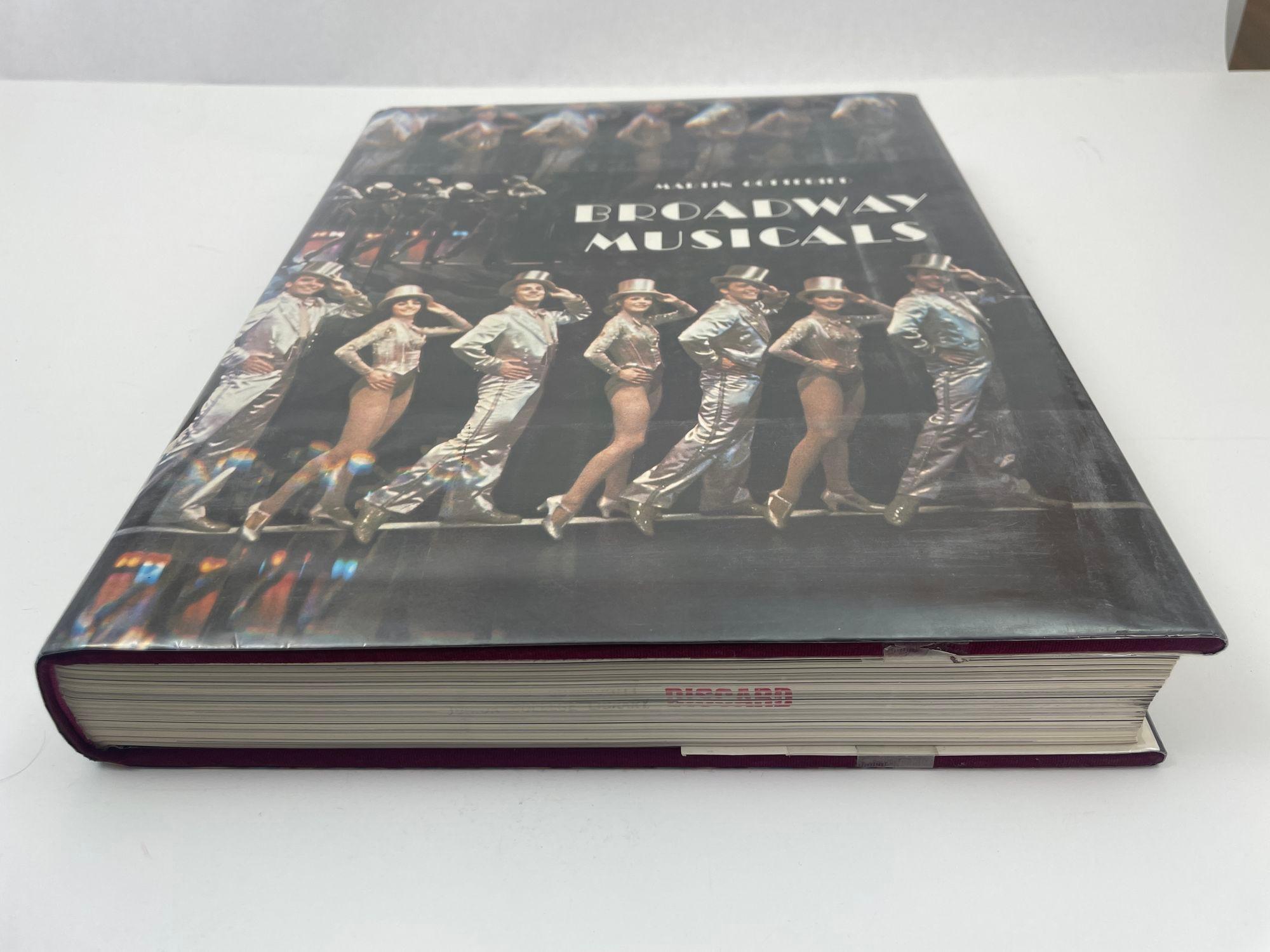 Broadway Musical Martin Gottfried 1980 hardcover book.Large heavy book.
A colorful tribute to the great Broadway shows of our time.
Profusely illustrated in color. New York: Harry N. Abrams, Inc.
Title Broadway Musicals Author Gottfried,