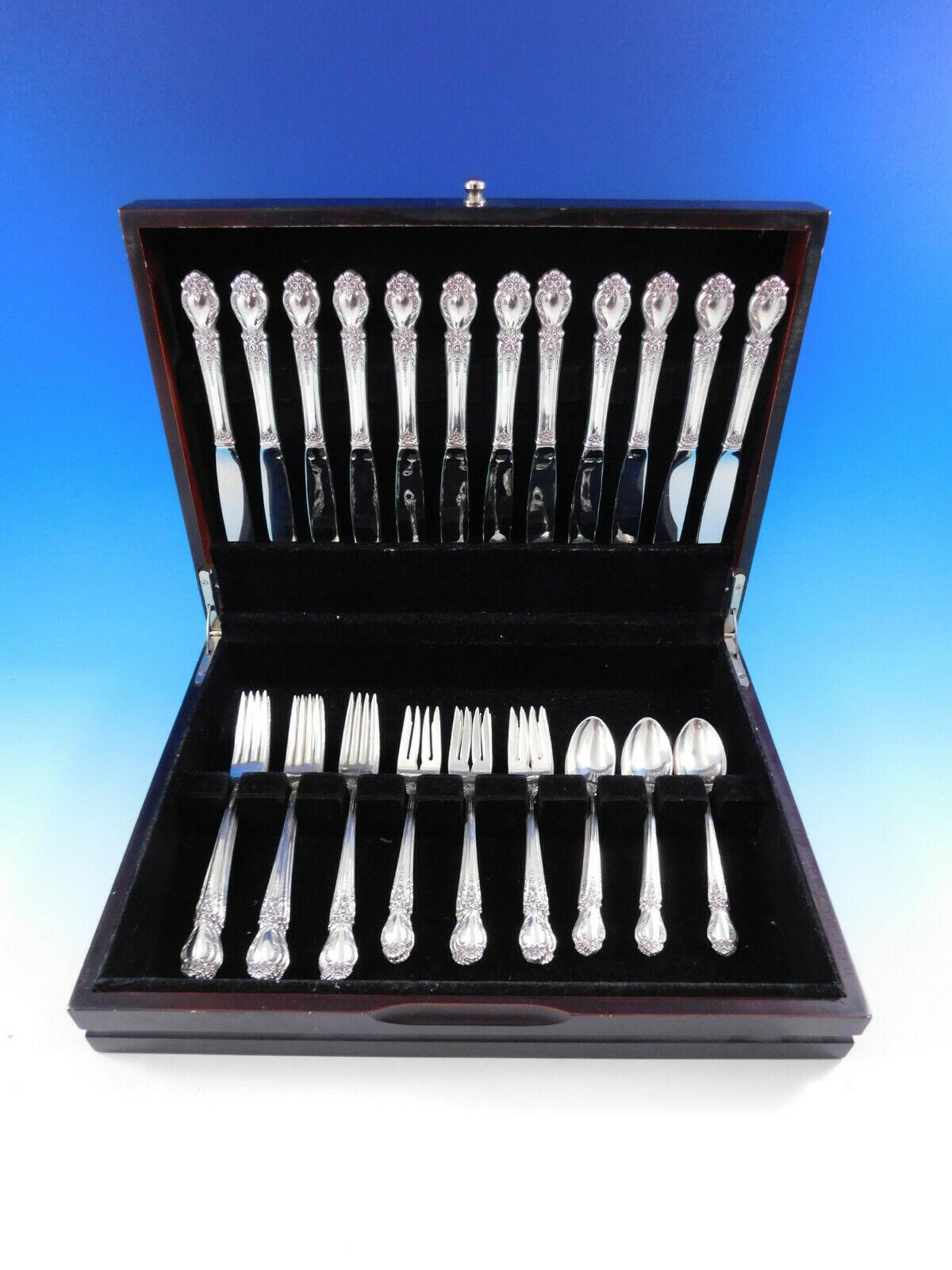 Heirloom quality Brocade by International sterling silver Flatware set, 48 pieces. This set includes:

12 knives, 9 1/4