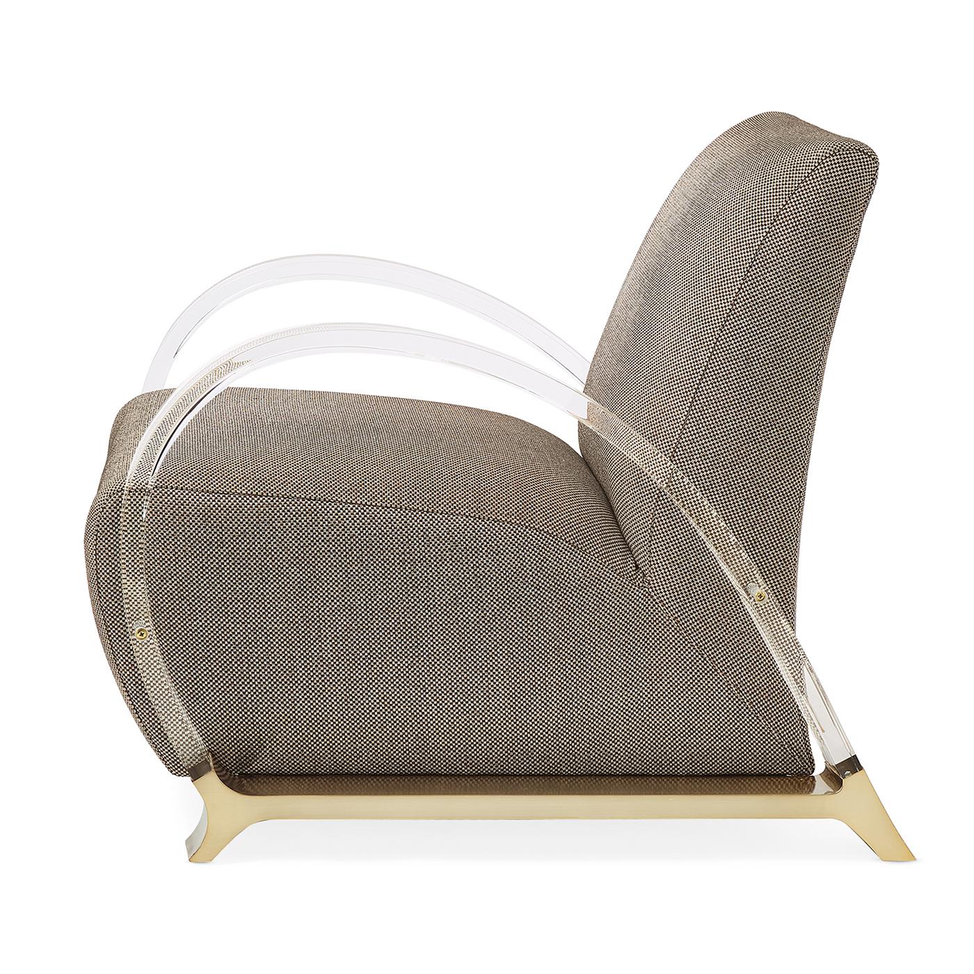 Broches modern armchair. A French style standout, it features shapely arms crafted of clear acrylic and reminiscent of a chic roadster. Expertly tailored upholstery in a basketweave fabric, features soft shades of bittersweet chocolate and
