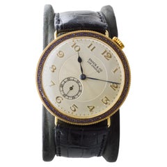 Brock & Co Armbanduhr aus 18 Karat massivem Gold mit Tasche 1920er Jahre