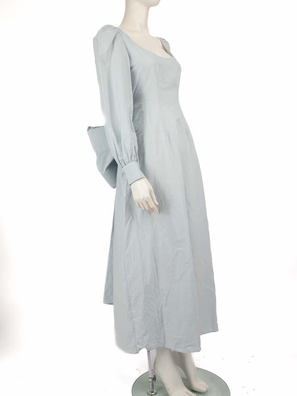 CONDITION is Very good. Minimal wear to the dress is evident. The brand label is loose on this used Brock Collection designer resale item.
 
 Details
 Blue
 Cotton
 Dress
 Maxi
 Wide round neck
 Long sleeves
 Buttoned cuffs
 Back detachable bow 

