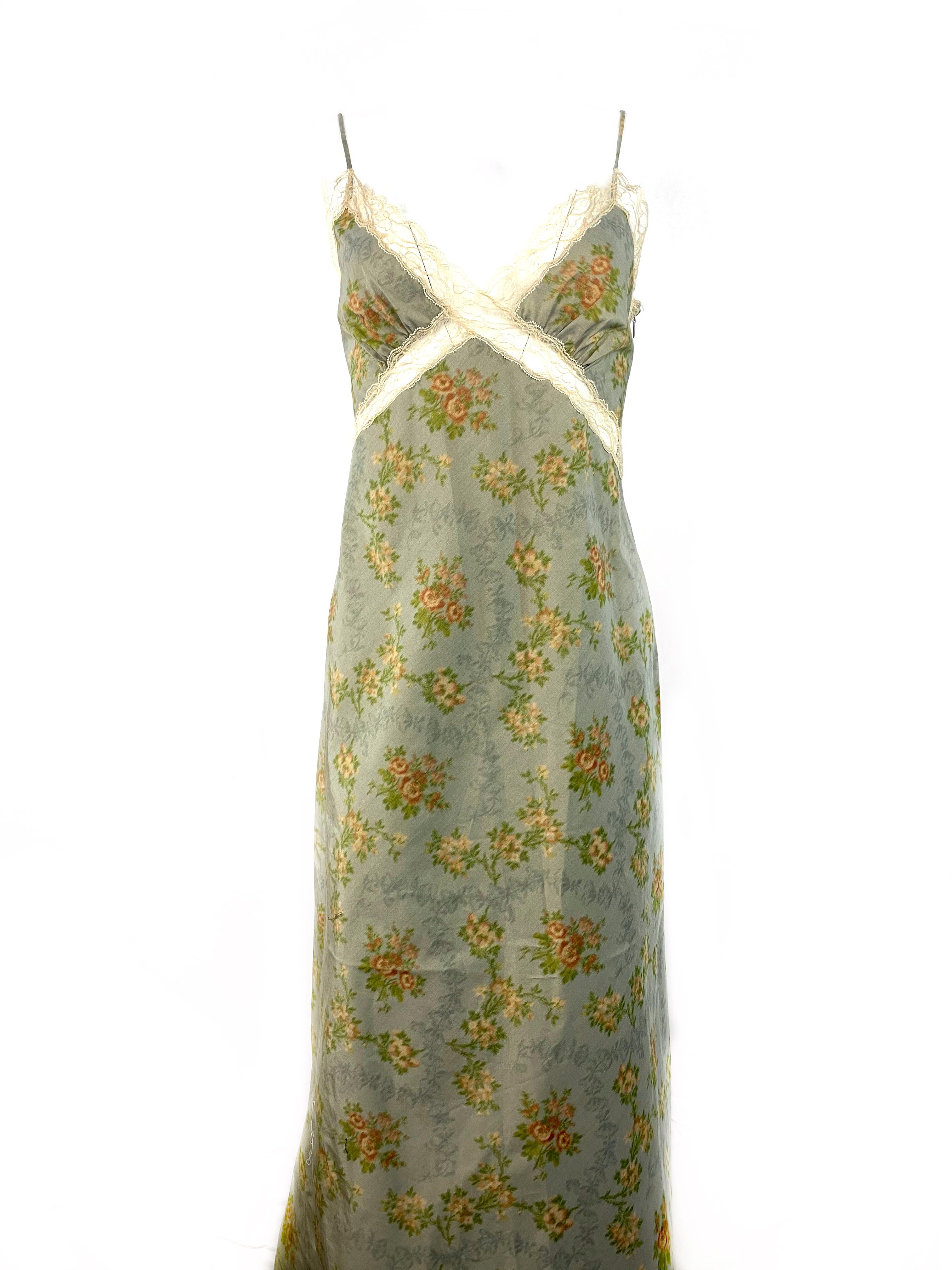 Product details:
Featuring grey maxi dress with floral print, ivory floral lace detail, spaghetti straps and side zip and hook closure.
Floor length with the ivory floral lace trimming on the bottom.
Made in Italy.