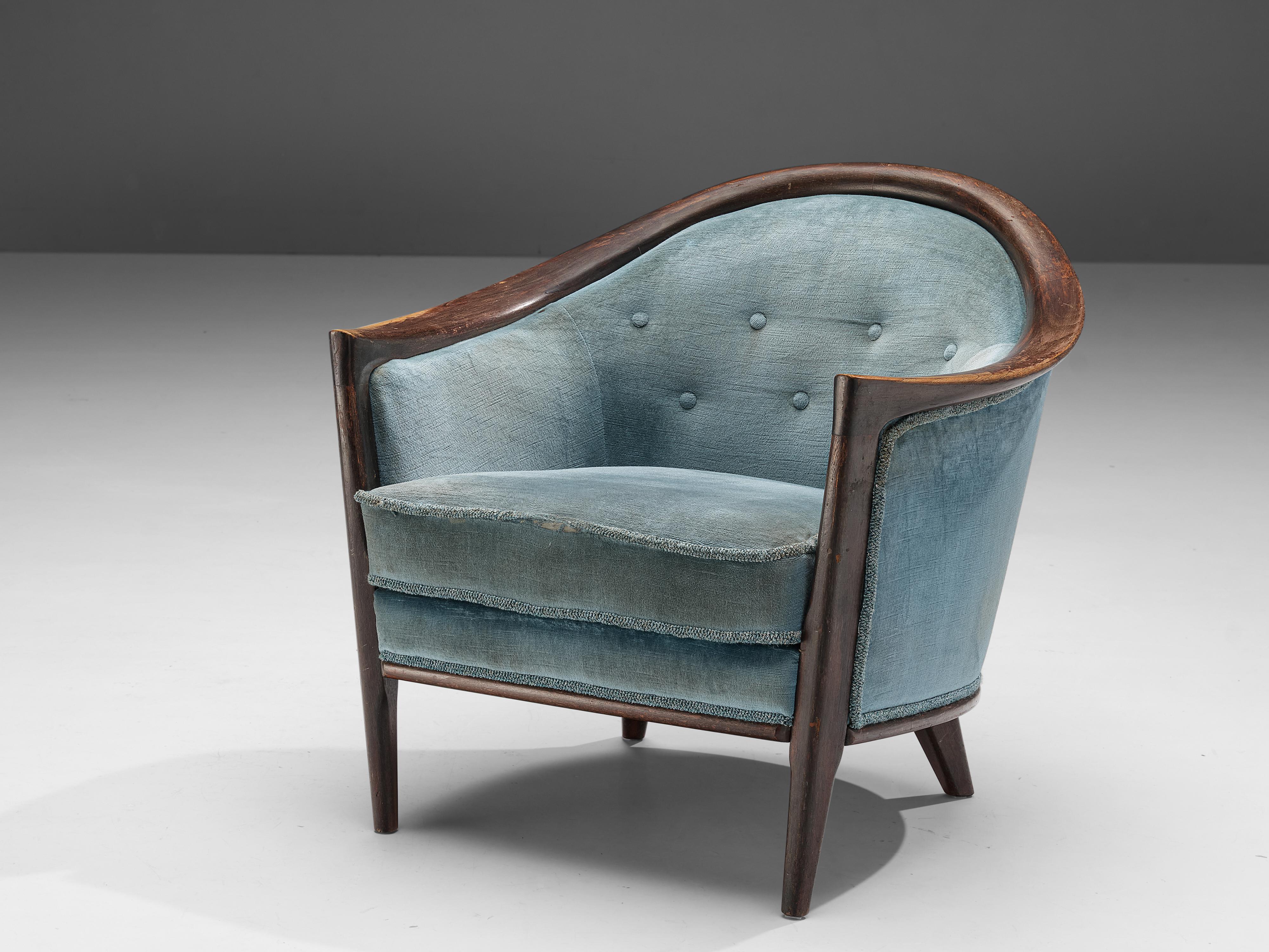 Bröderna Anderssons, lounge chair, velvet, teak, Denmark, 1950s

A deep dark frame in wood curves around the seat and backrest. The chair is upholstered in a soft blue velvet that is tufted. The light color of the blue is in a stunning contrast with
