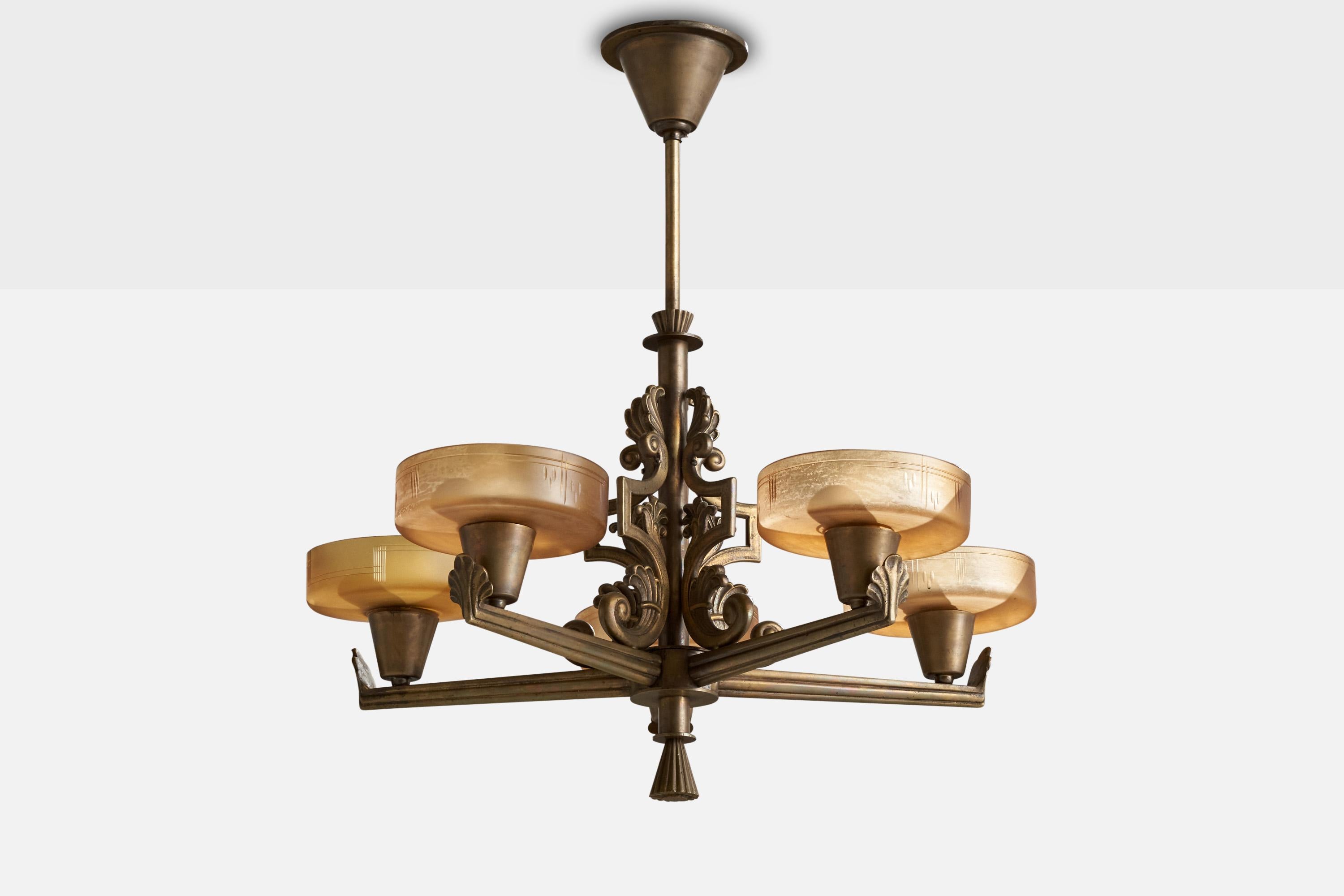 A brass and glass chandelier designed and produced by Bröderna Malmström Metallvarufabrik, Sweden, c. 1930s.

Overall Dimensions (inches): 25.75” H x  23.625” Diameter
Dimensions of Canopy: 3.5 ” H x 4.75” D
Stem length: 6.5 ”H
Bulb Specifications: