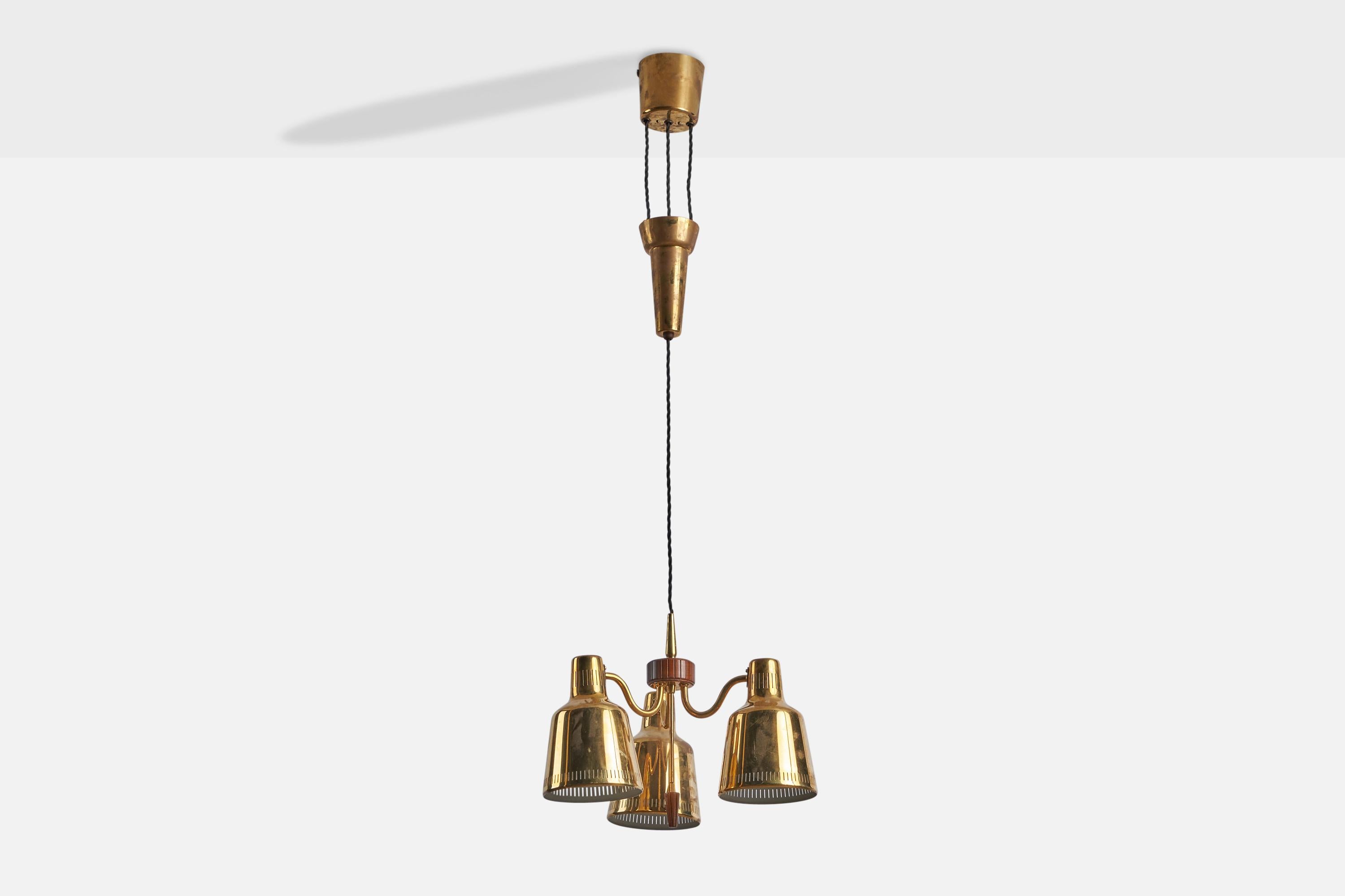 A brass chandelier attributed to Bröderna Malmström Metallvarufabrik, Sweden, 1940s.

Overall Dimensions (inches): 41” H x 14” Diameter 
Bulb Specifications: E-26 Bulb
Number of Sockets: 3