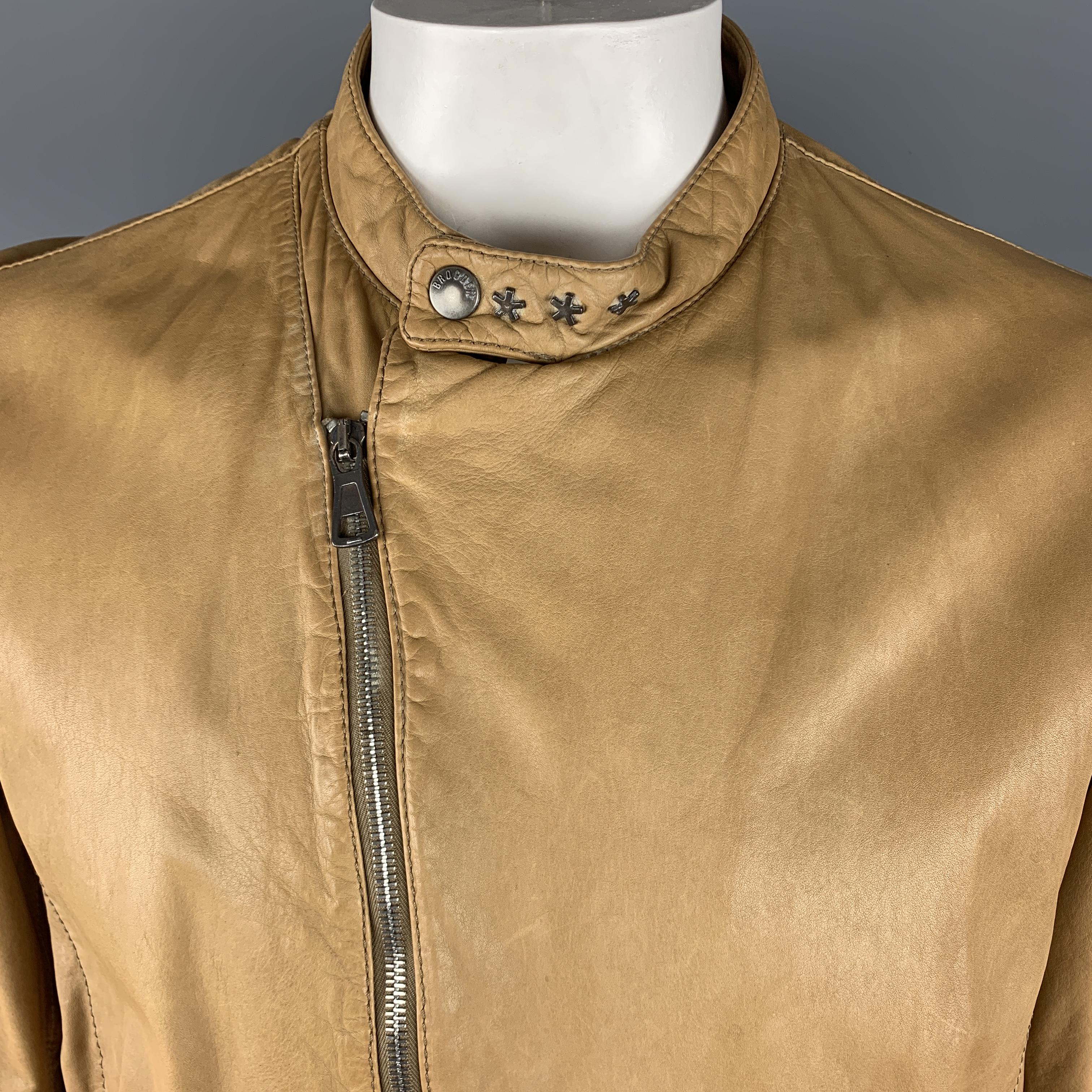 BROGDEN Distressed Motorcycle Jacket comes in a tan tone in a leather material, with zip at pockets and cuffs, and silver tone metal hardware details.  As Is.
 
Good Pre-Owned Condition.
Marked: M
 
Measurements:
 
Shoulder: 18 in.
Chest: 50