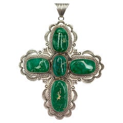 Colgante en forma de cruz de plata de ley con turquesa Broken Arrow de Alvin Lee