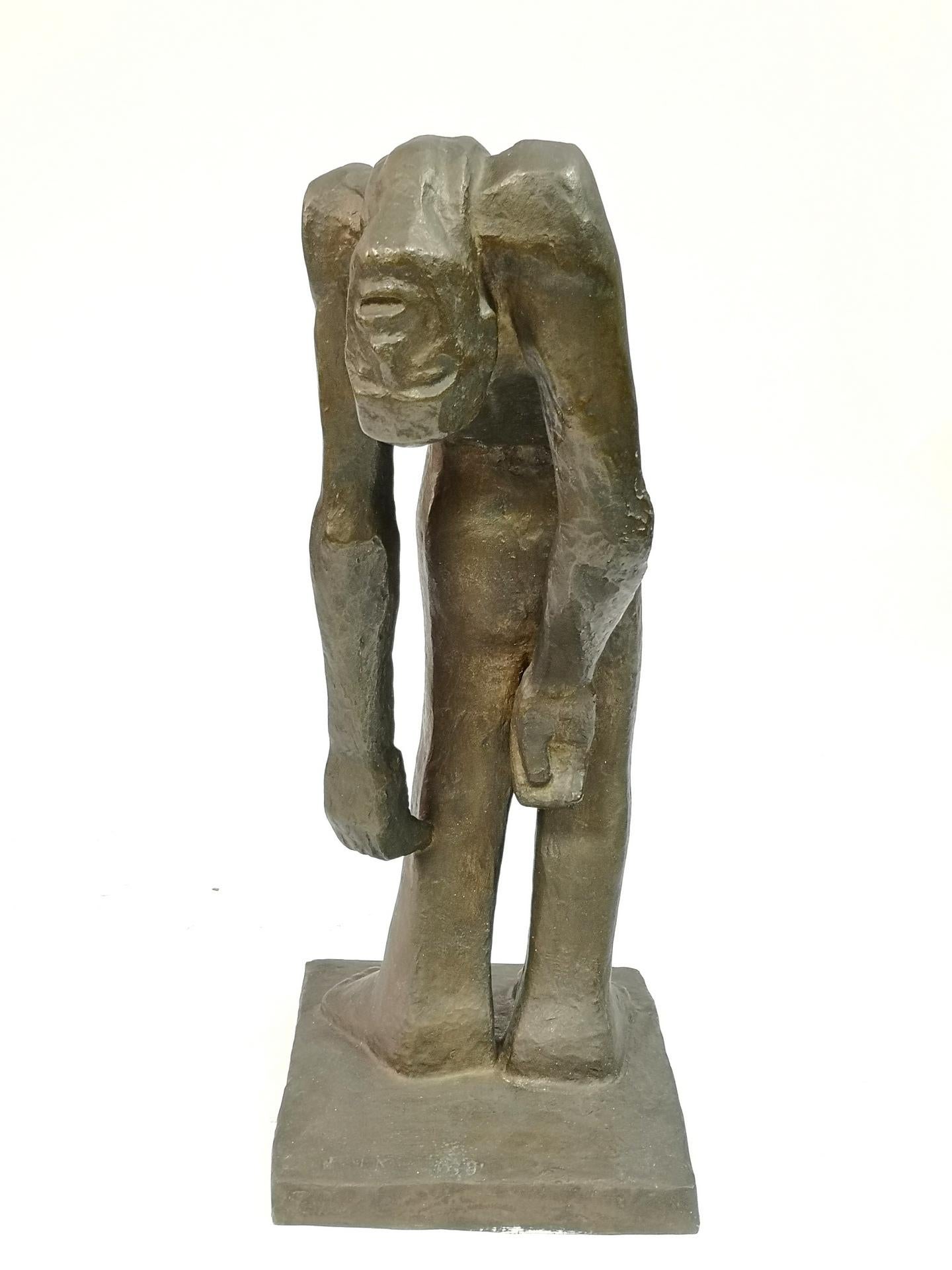 Large, signed bronze piece, depicting a figure bent, broken backwards. Signed, written in in the base 