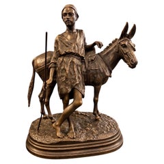 Bronce de Alfred Dubucand <<< Arriero de burro de El Cairo >>>, hacia 1890