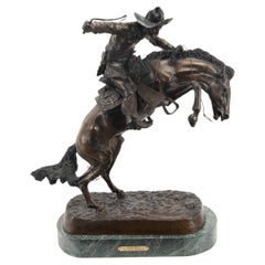 Bronzeskulptur „Bronco Buster“ aus Bronze, nach Frederic Remington