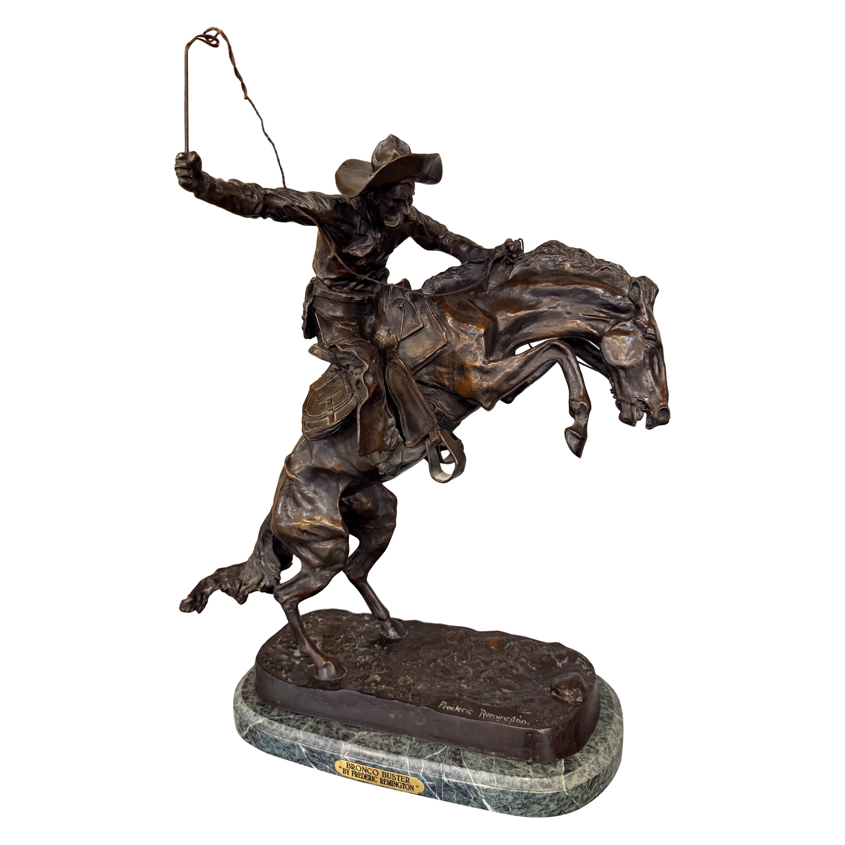 Scultura in bronzo “Bronco Buster” di Frederic Remington, base in marmo, riproduzione