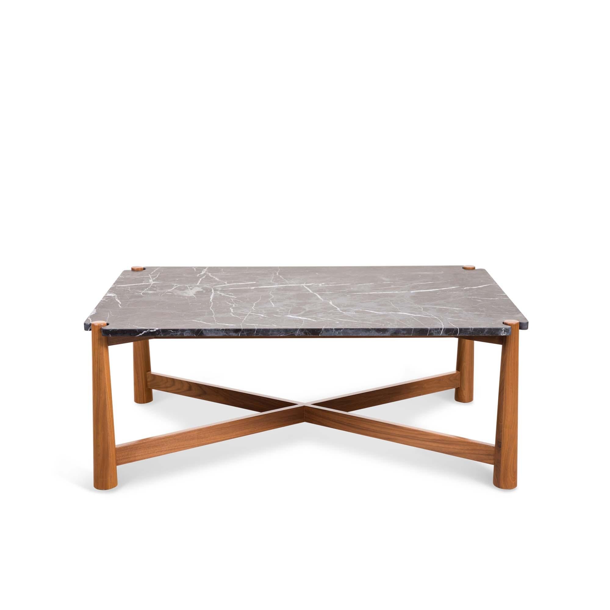 The Bronson coffee table features a stone top with notched corners that rests atop a detailed American walnut or white oak base.

The Lawson-Fenning Collection is designed and handmade in Los Angeles, California. Reach out to discover what options