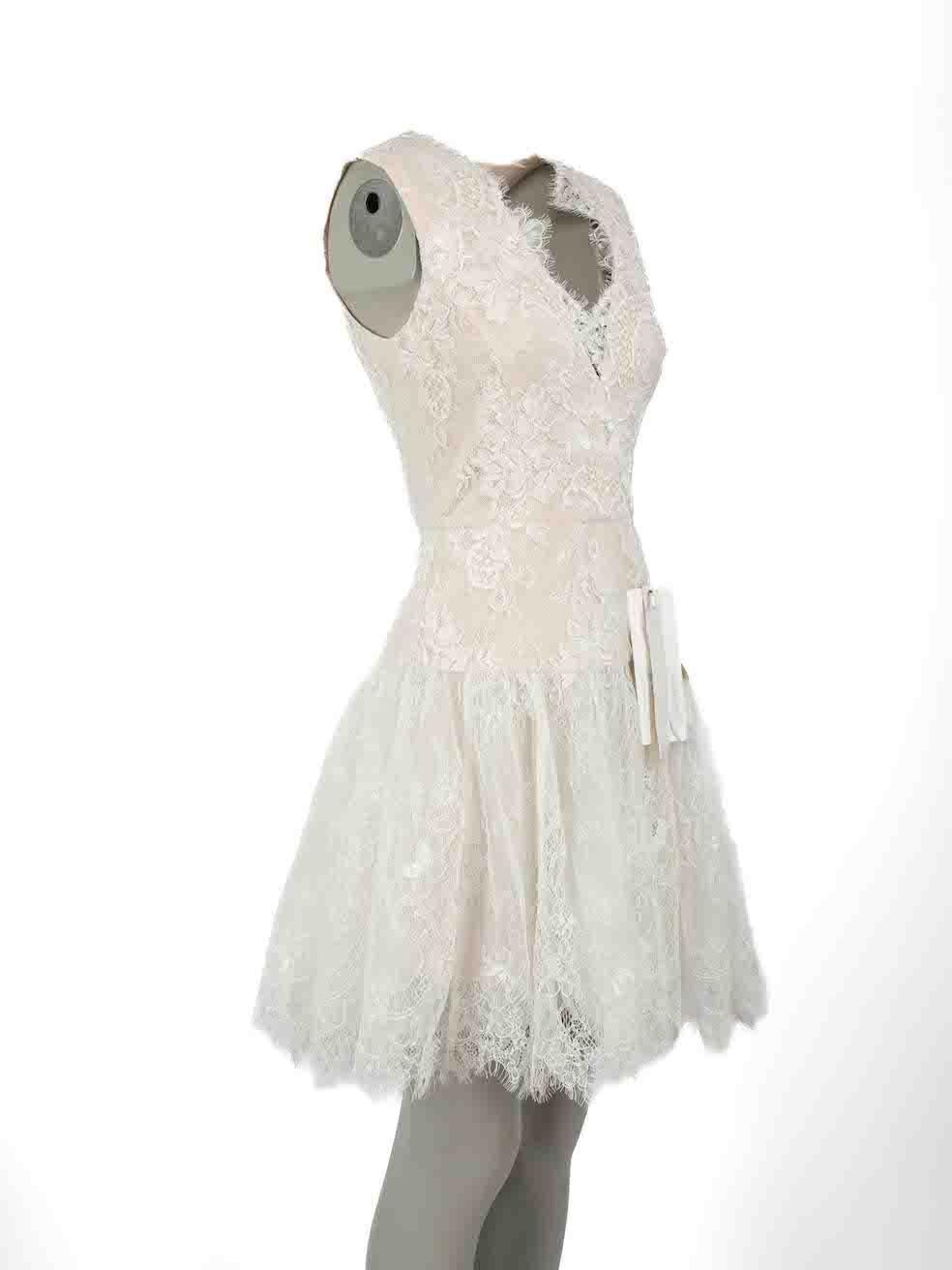 CONDITION is Never worn, with tags. No visible wear to dress is evident on this new Bronx & Banco designer resale item.
 
Details
White
Polyester
Dress
Floral lace pattern
Mini
Sleeveless
V-neck
Back zip fastening
 
Made in China
 
Composition
100%