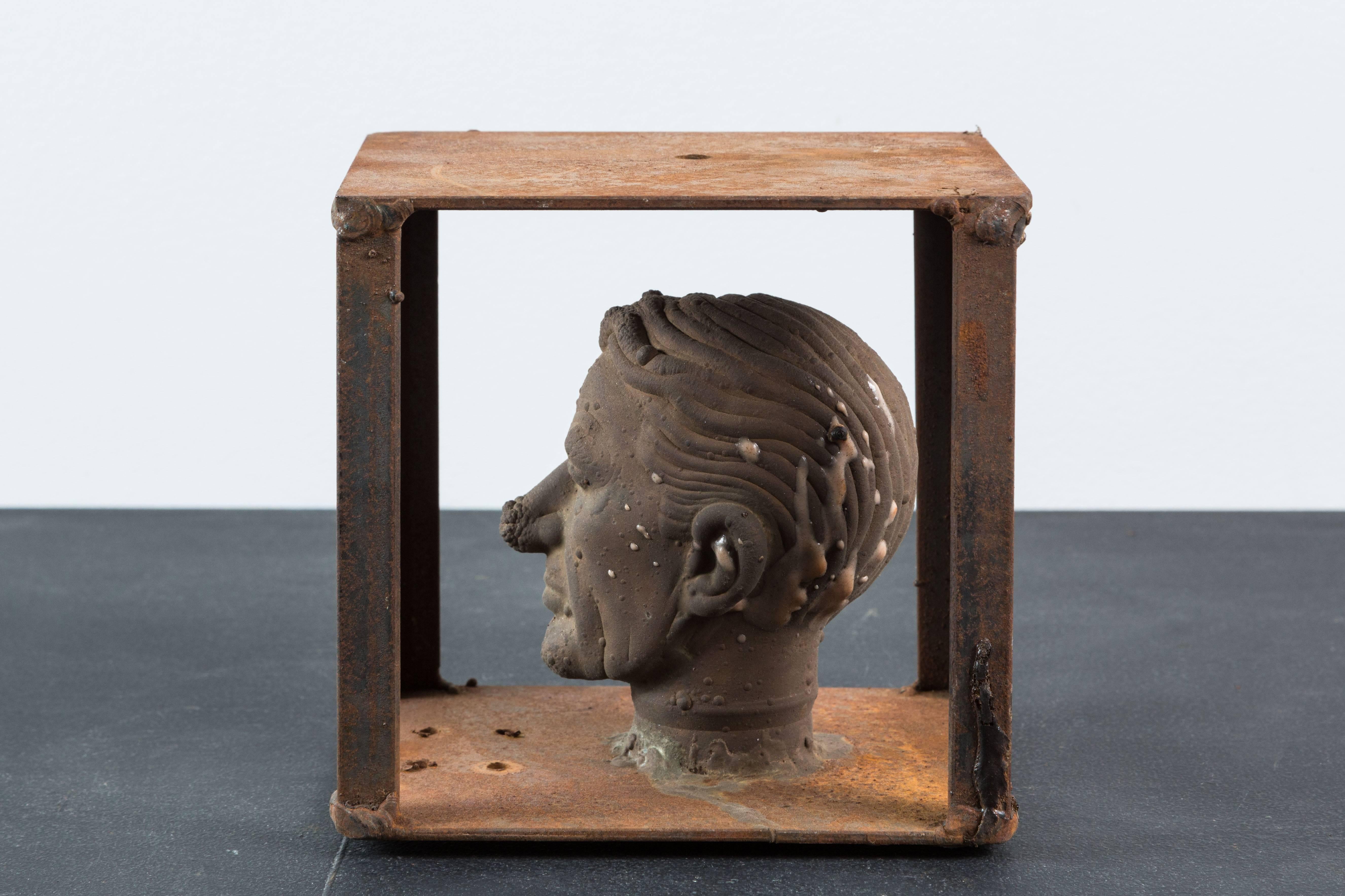 This guy is someone, but we can't figure out who. Many were marked with the character. Unfortunately this guy was not. Striking facial features. 

Vintage Bronx toy factory Industrial doll head toy mold. Fantastic patina and layered surface from