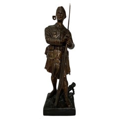 Soldado escocés de bronce con kilt de la 1ª Guerra Mundial.