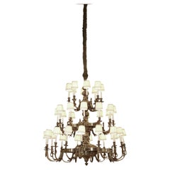 Lustre Conrad à 36 lumières en bronze de Waldorf Astoria