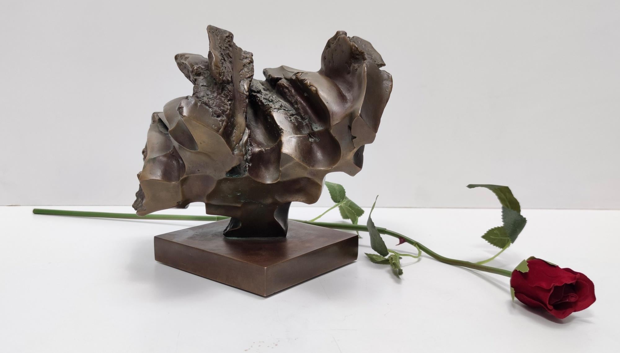 Made in Italy, 1960s. 
This sculpture is made in bronze. 
It is a vintage piece, therefore it might show slight traces of use, but it can be considered as in excellent original condition and ready to become a piece in a home. 

Width: 24 cm 
Depth: