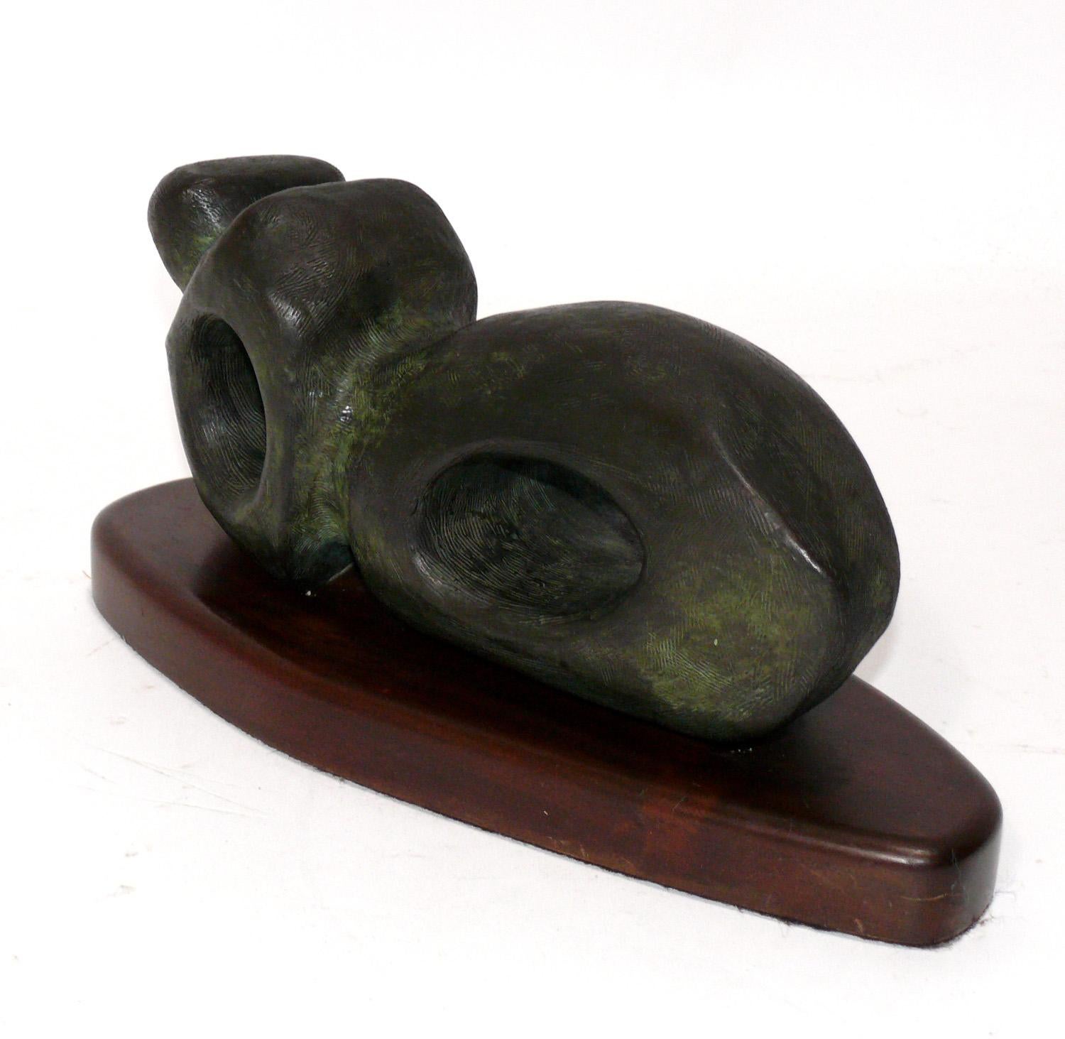Bronze Abstract figural sculpture, in the manner of Henry Moore or Barbara Hepworth, indistinctly signed, and dated 1986, and numbered 1 from a limited edition of 10. Beautiful verdigris patina and textural finish to the bronze.