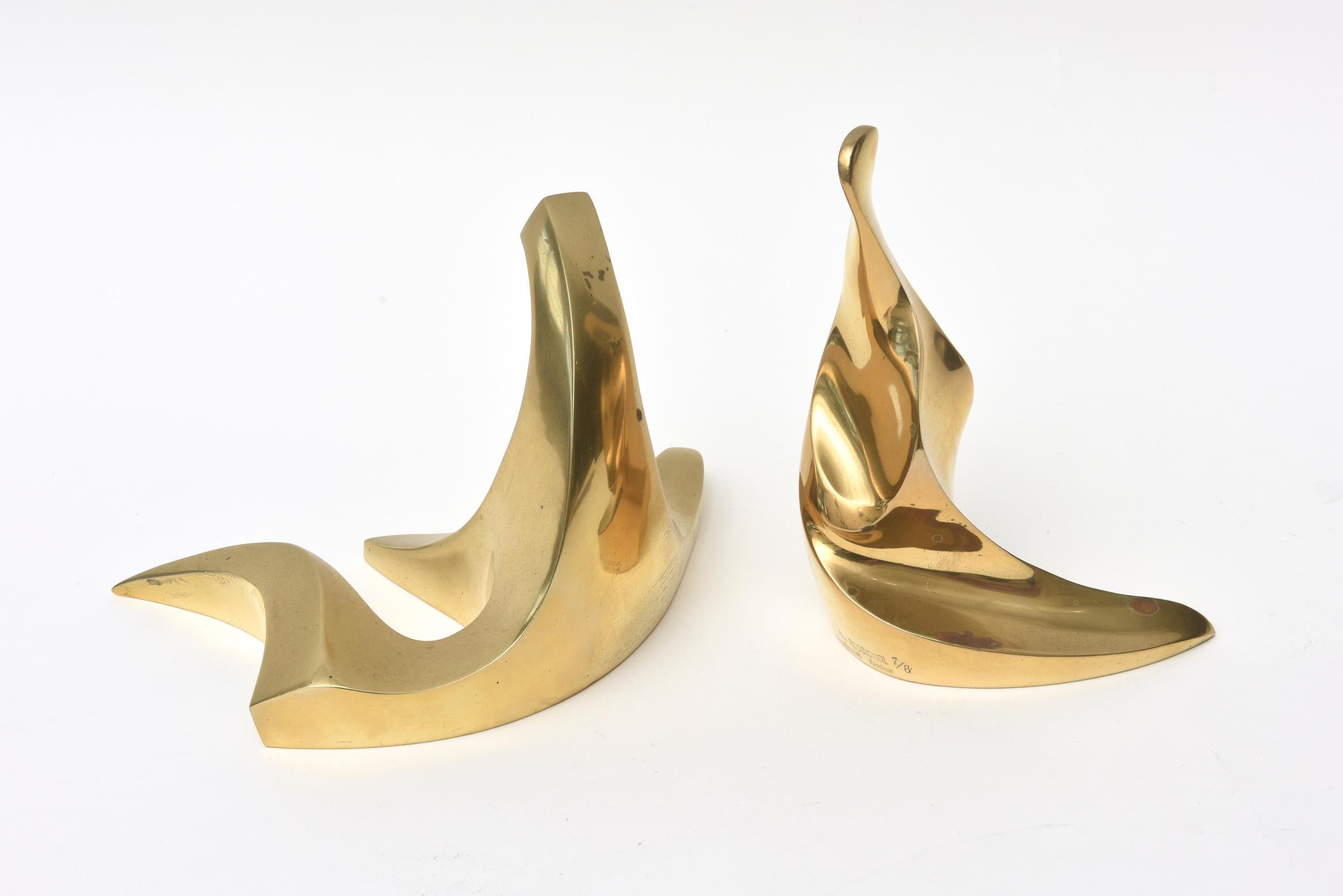 These lovely pair of bronze abstract sculptures seem to be of animal seal nature and form that look like abstract body forms. They are engraved Alix Rossignol and are a limited edition of 7/8 with a foundry mark. The sculptor is French. These are