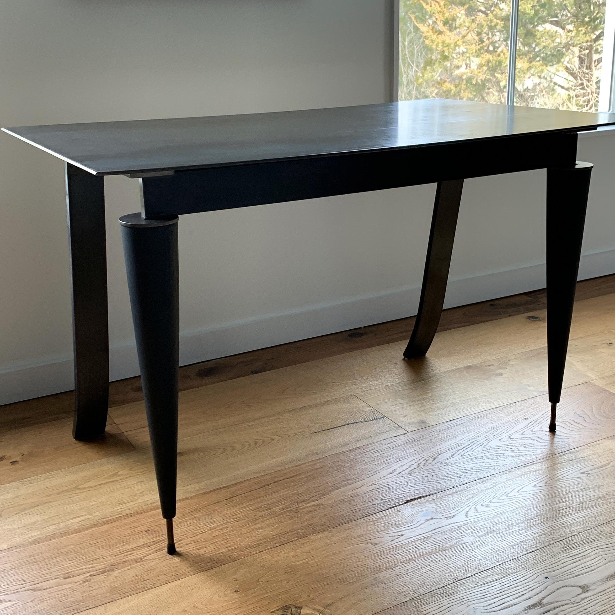Bronze Age desk by Mark Zeff, hot rolled steel with wood tanned top.

Bronze Age collection by Mark Zeff
Bronze Age is a furniture collection designed by Mark Zeff. Zeff takes inspiration from his favorite designers from Art Deco and 1940s French