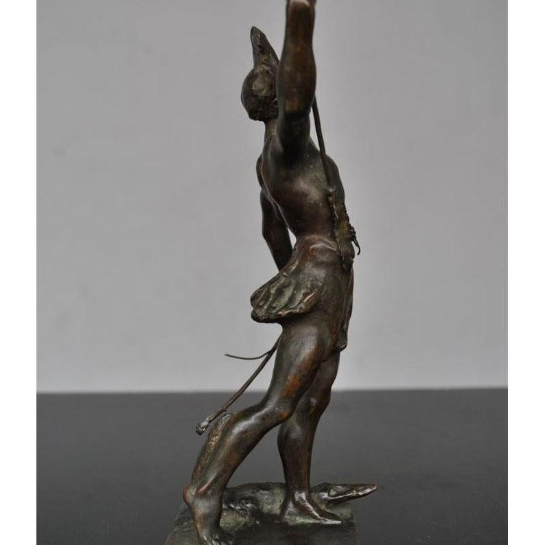 Bronzo marrone patinato marrone raffigurante l'allegoria delle Americhe firmata G. Varany. Iscrizione A. AFINTAA sulla base.