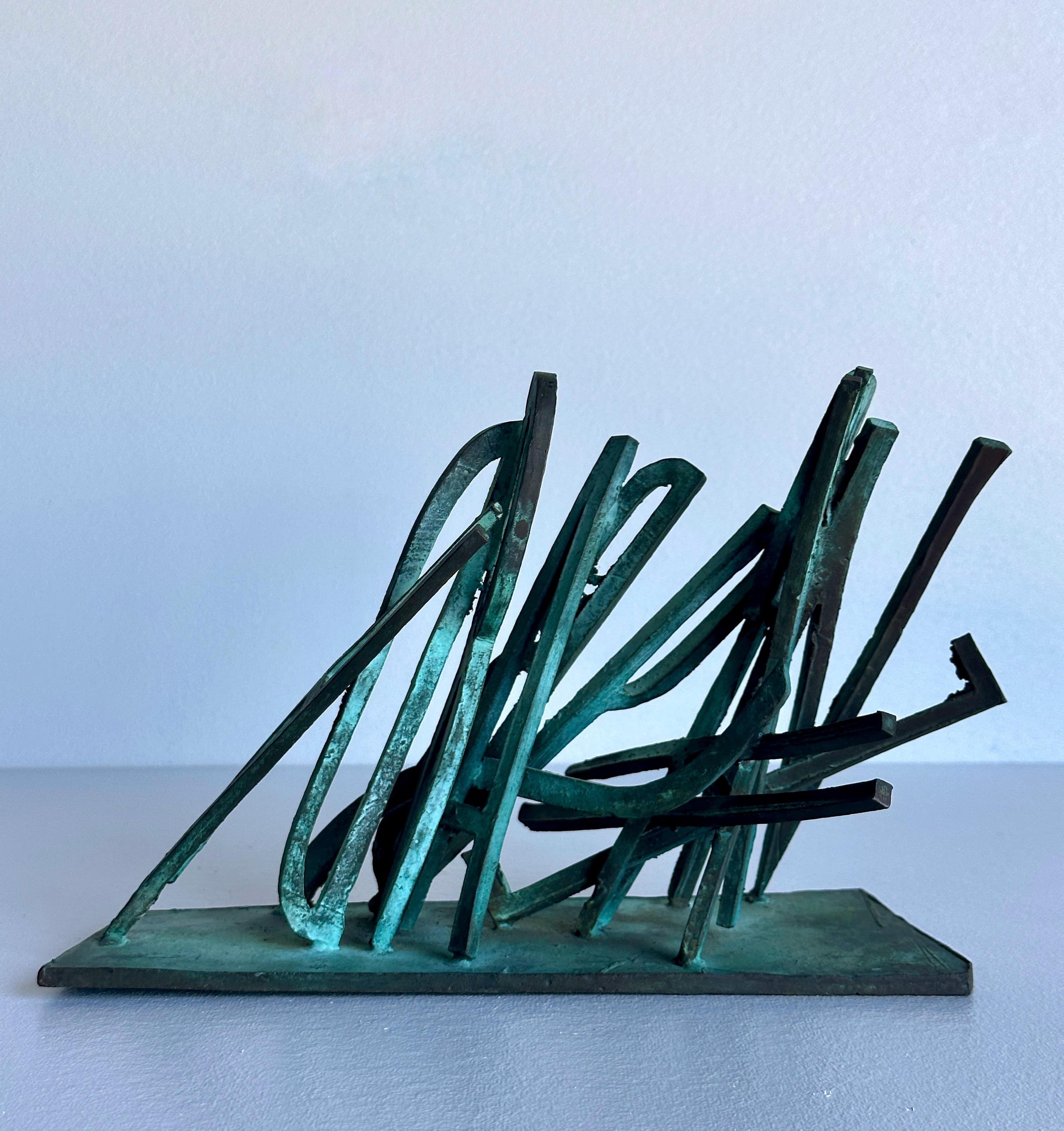 This bronze “leaning alphabet” sculpture is signed by the artist, who was known by his given name but also went by an assumed name; he called himself Sharbek Almajkov. We acquired this quirky piece from a former gallery owner in the Berkshires who