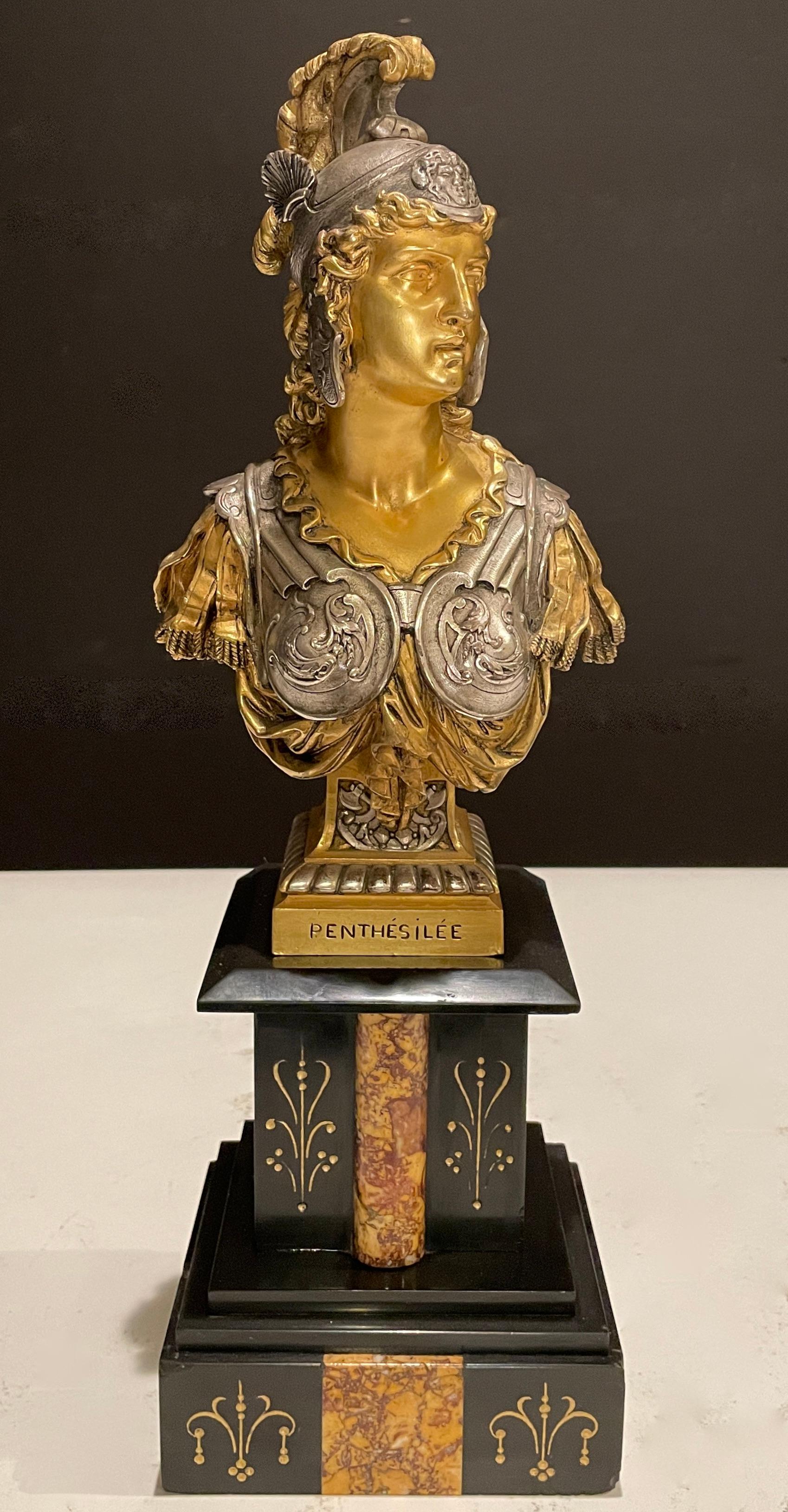 Fine quality gilt and silvered bronze bust of Amazonian Queen Penthesilea by Emile Hebert. Original 19th century bronze bust mounted on a period Belgian black marble base with gilt details and Brèche d' Alep marble. 

Pierre-Eugène-Émile Hébert