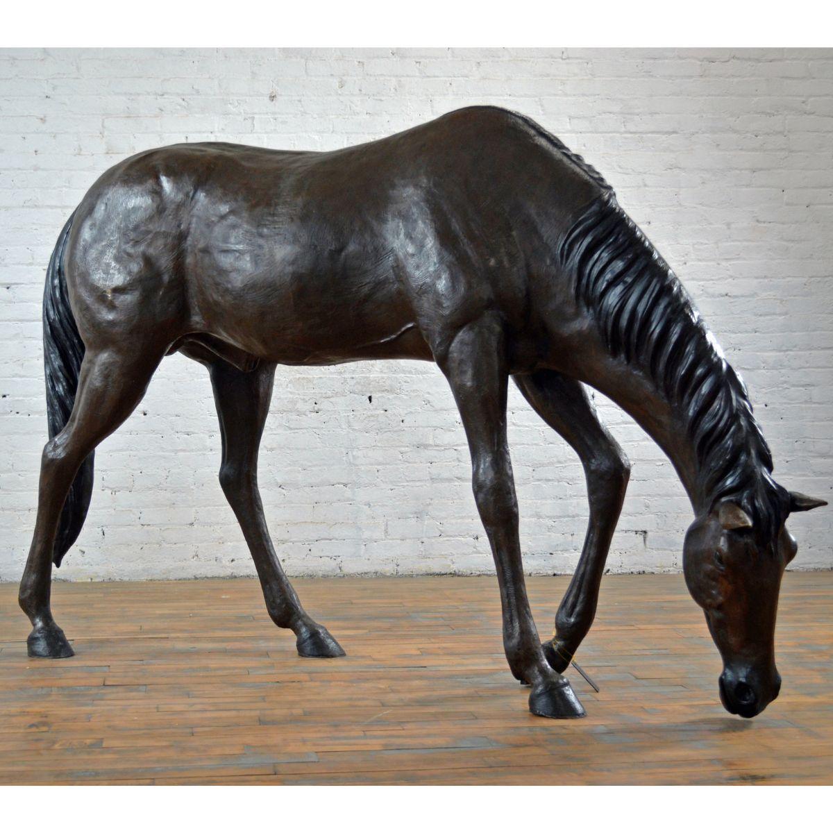 Our lost-wax bronze American Quarter Horse is a beautifully designed animal statue that will captivate everybody the moment they lay eyes on this realistic horse sculpture. Standing at a life-sized height with its head bowed down as though eating or