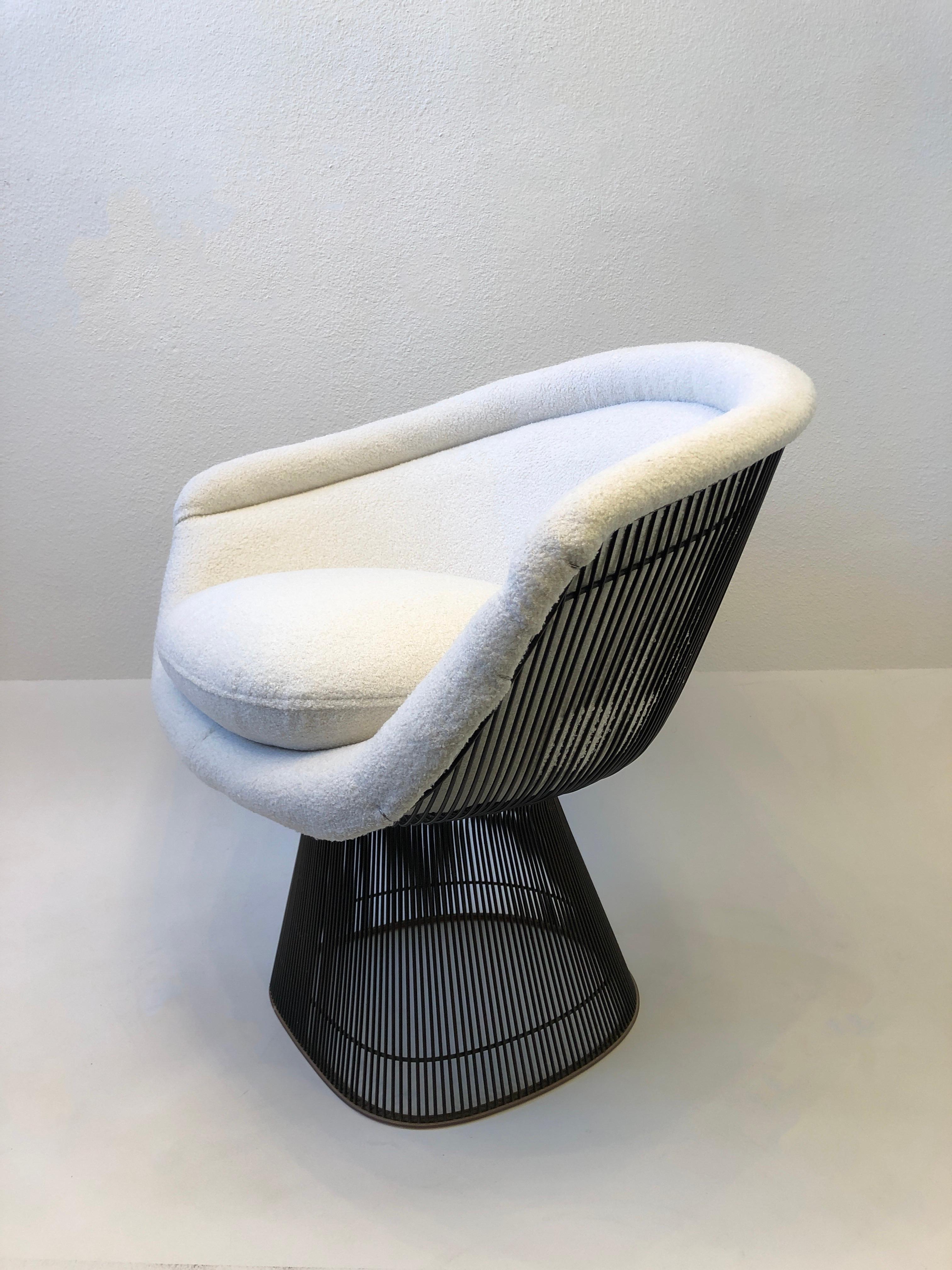 Iconic 1960’s Bronze lounge chair by Warren Platner for Knoll.
Newly recovered in a soft Boucle fabric. Retains original knoll label.
The frame is in original condition, so it show minor wear consistent with age. 
Measurements: 36” Wide, 24”
