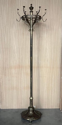 Appendiabiti Art Nouveau Belle Epoque in bronzo e ottone brunito, piedi a grifone in bronzo