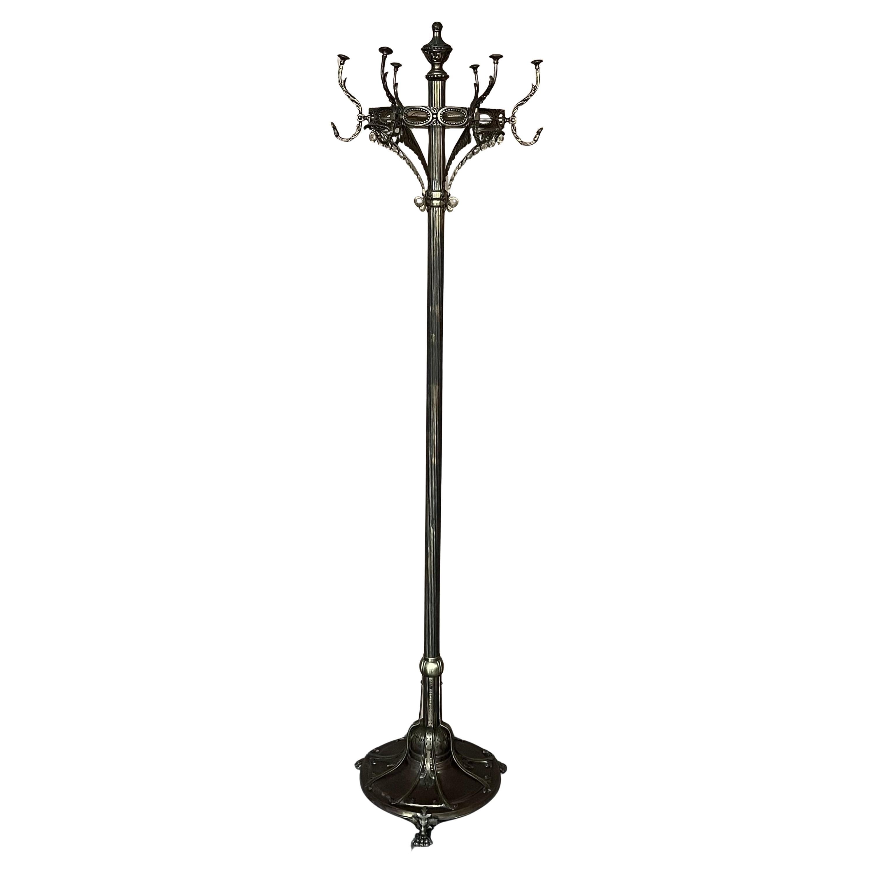 Appendiabiti Art Nouveau Belle Epoque in bronzo e ottone brunito, piedi a grifone in bronzo