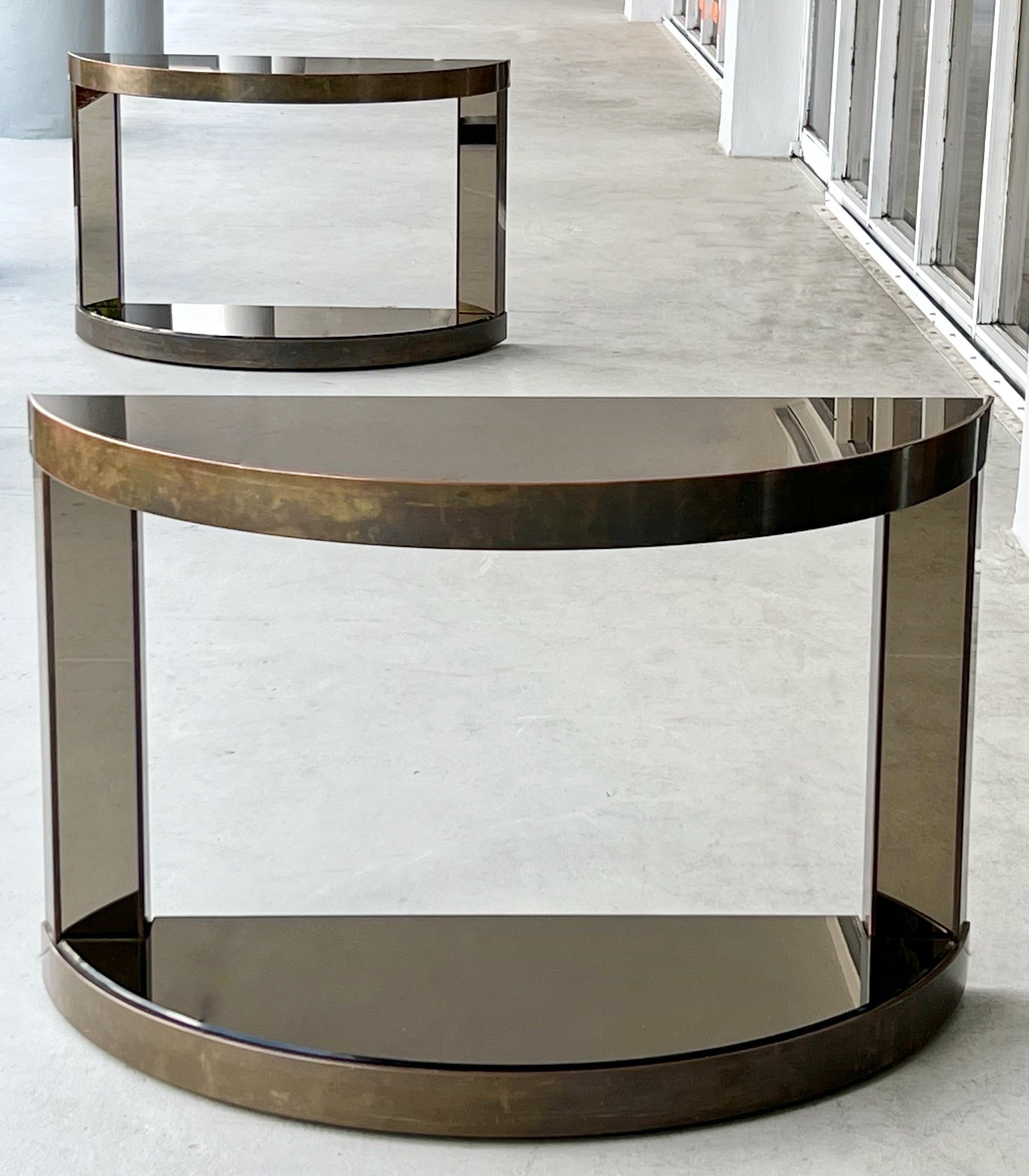 A pair of Minimalist cantilevered consoles. Very clean profile. Bronze mirror on tops and front of vertical elements.