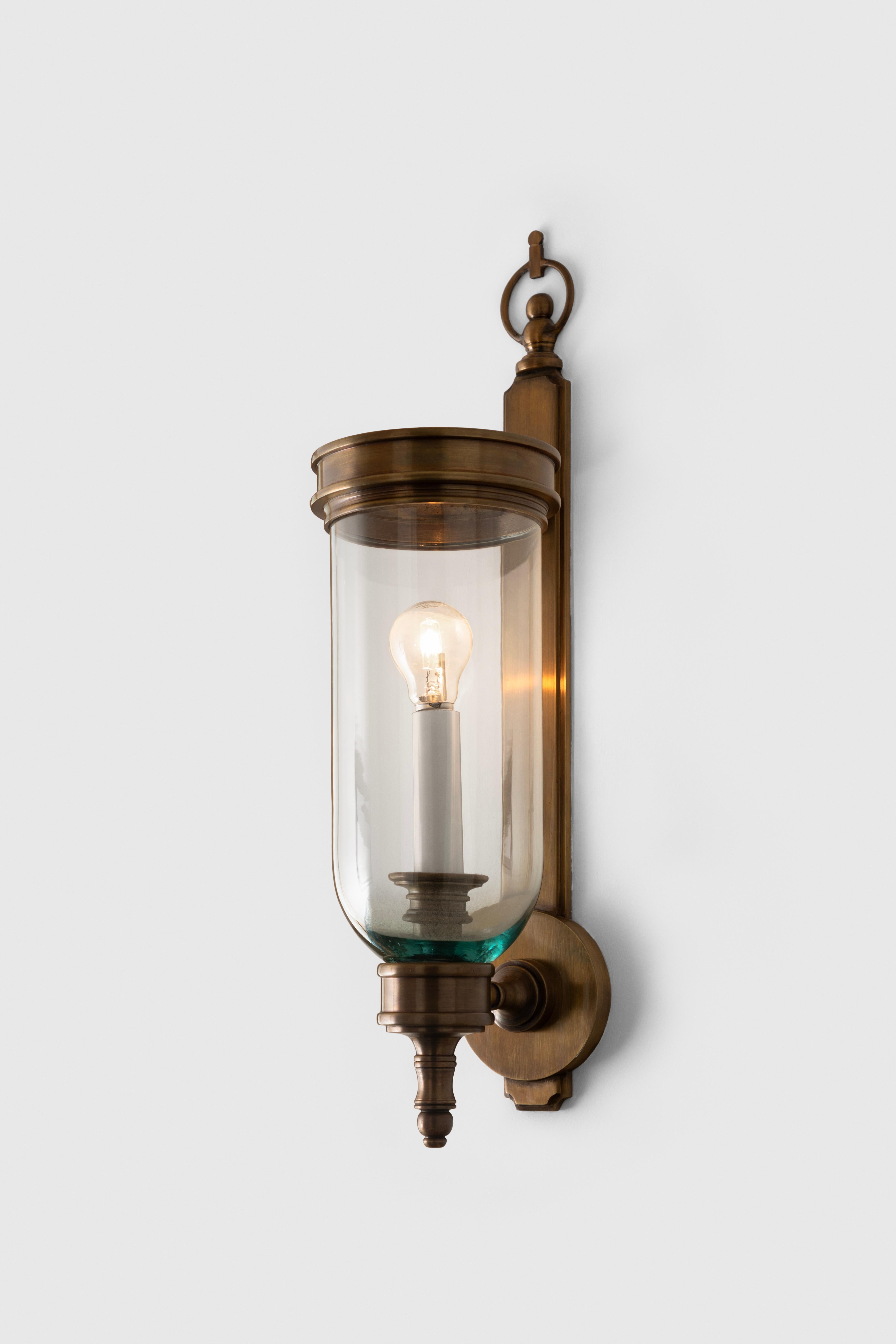 Cylindric shape sconce made out of brass and capello glass