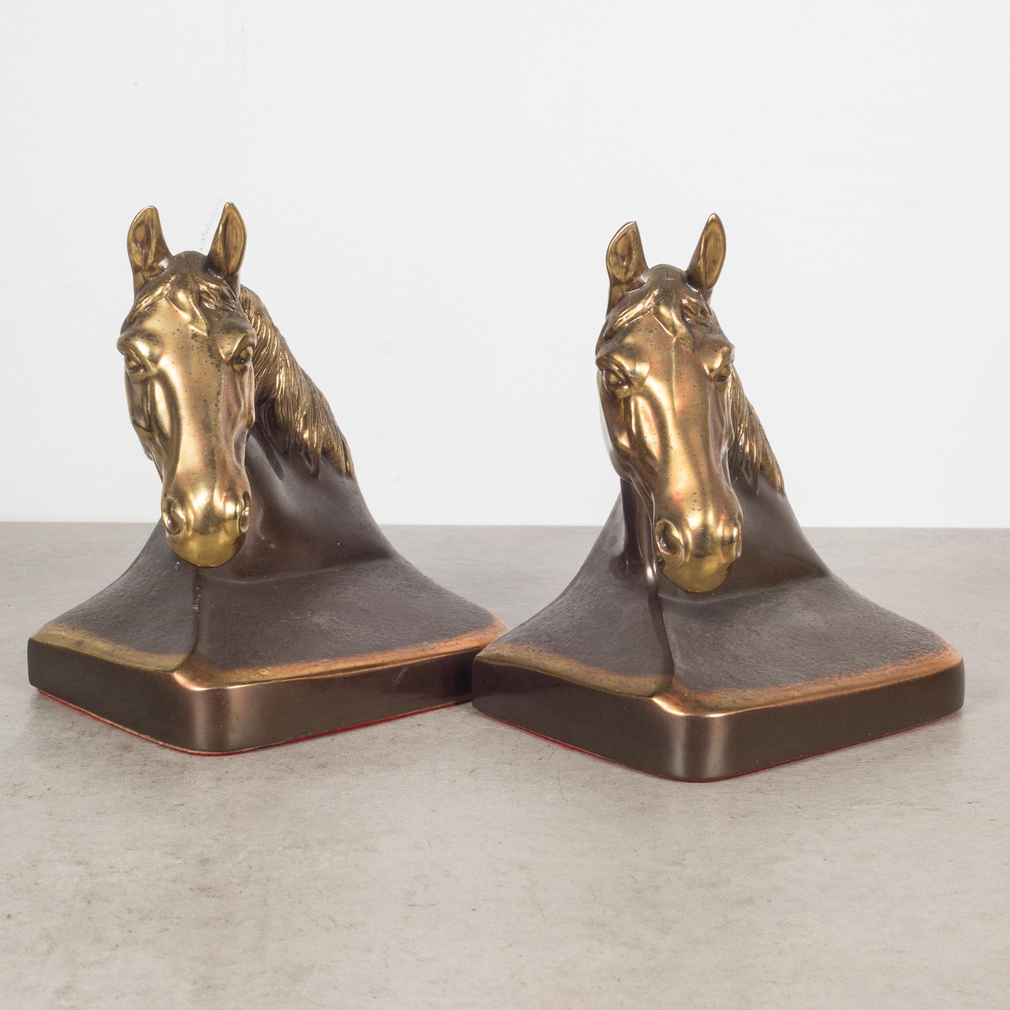 ABOUT

A vintage pair of bronze and copper plated horse bookends with original felt and original PMC stickers.

 CREATOR Philadelphia Manufacturing Company. 
 DATE OF MANUFACTURE c.1940s.
 MATERIALS AND TECHNIQUES Bronze Plate, Felt.
