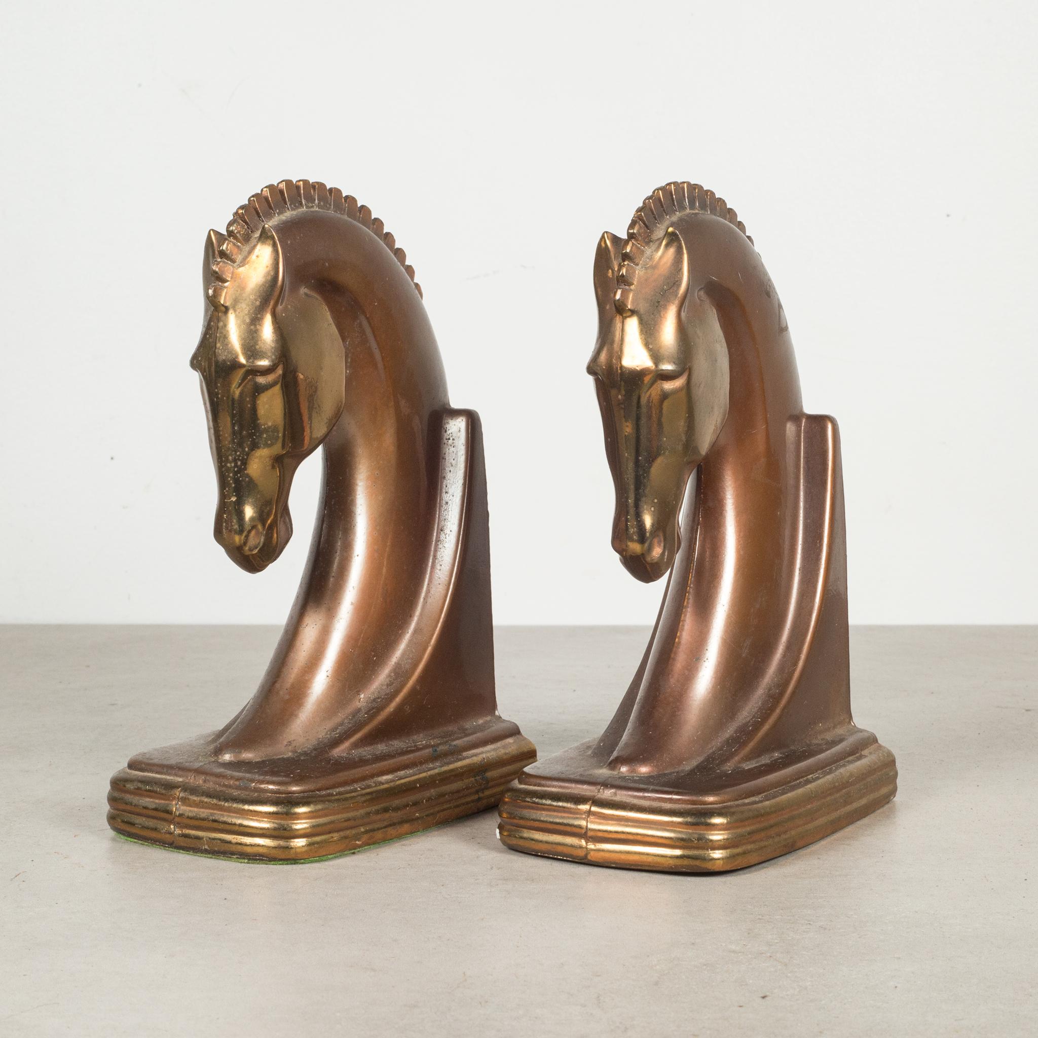 About

An original pair of Art Deco cast metal Trojan horse bookends manufactured by Dodge Trophy Inc. Los Angeles California USA. Both pieces have retained their original bronze and copper finish and are in good condition with appropriate patina