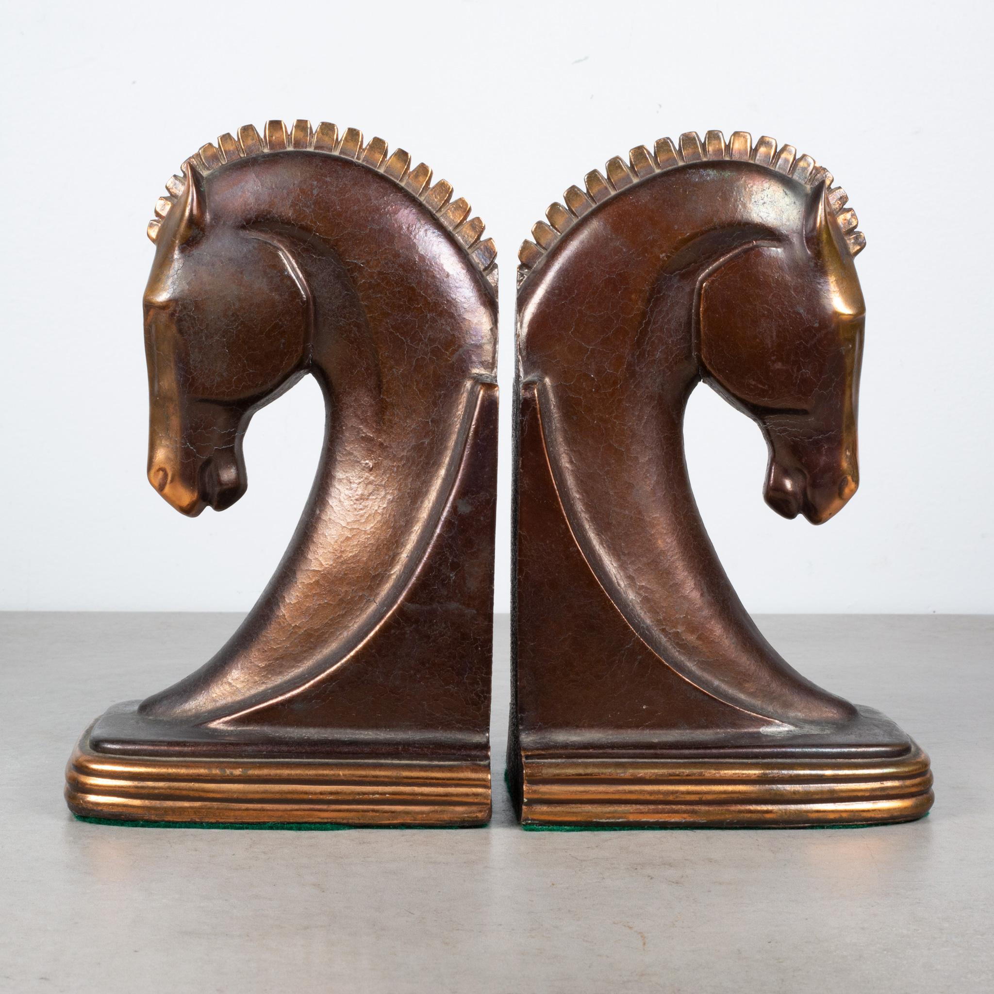 ABOUT

An original pair of Art Deco Trojan horse bookends manufactured by Dodge Trophy Inc. Los Angeles California USA. Both pieces have retained their original bronze and copper finish and are in good condition with appropriate patina for their