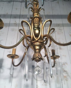 Lustre en bronze et cristal dans le style de la Maison Bagus