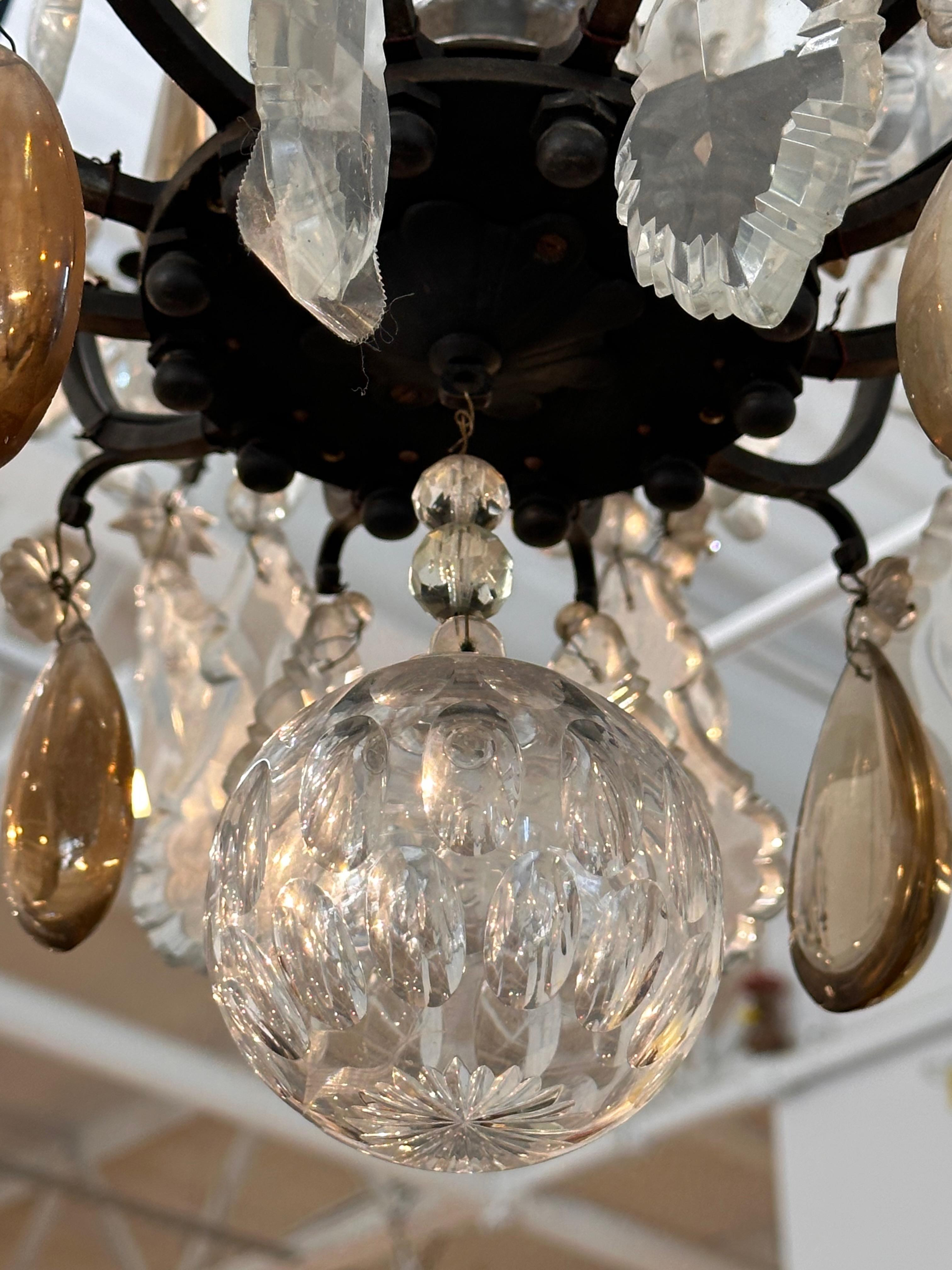 French Bronze and crystal chandelier. Very elegant. Made in the 1950s. For Sale